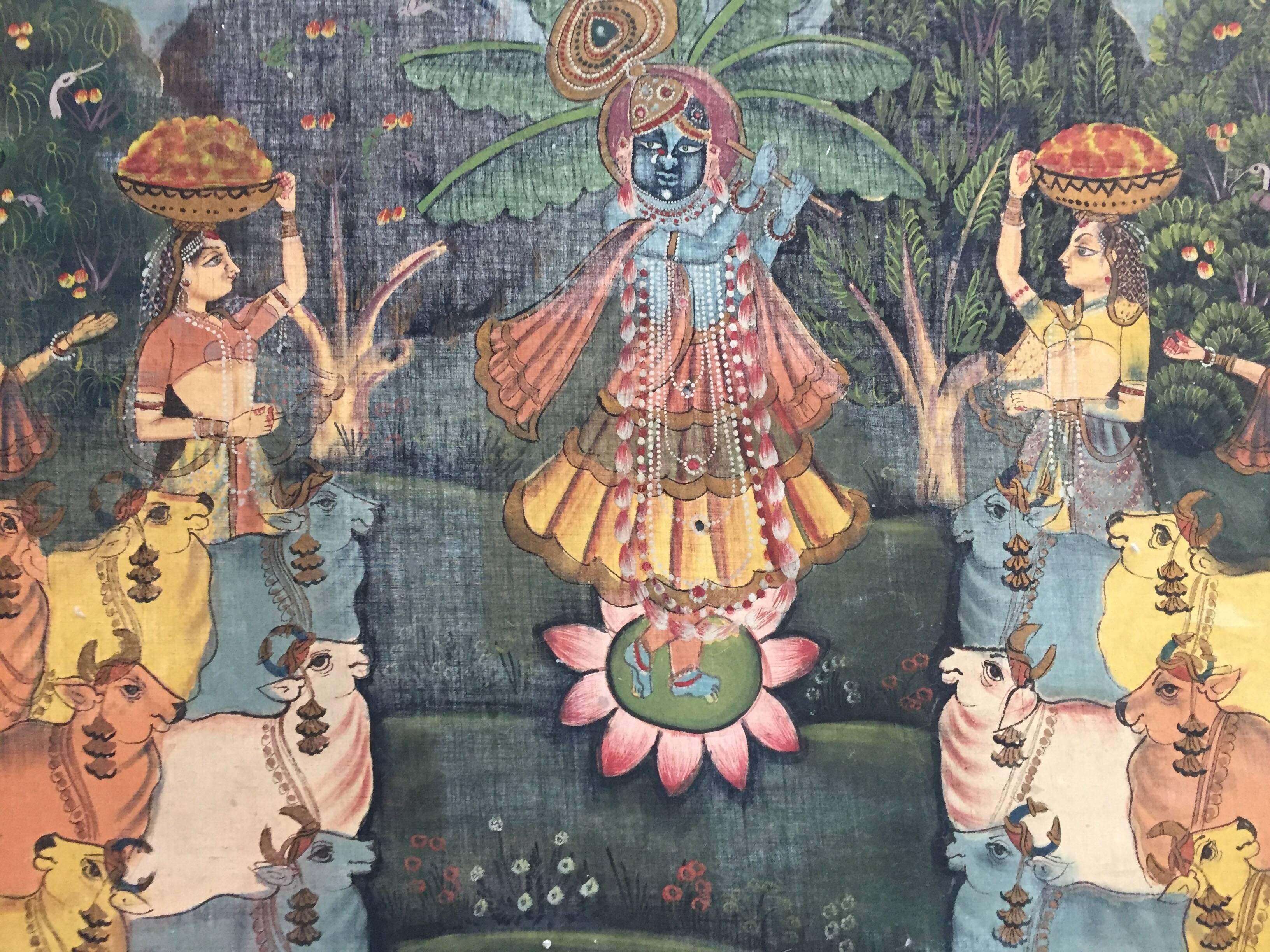 A large Pichhavai painting depicting Krishna, represented in multiple places with female Gopis dancing and offering, great colors, the composition is enclosed in a lush green forest and the colors of the dresses in yellow and oranges play off