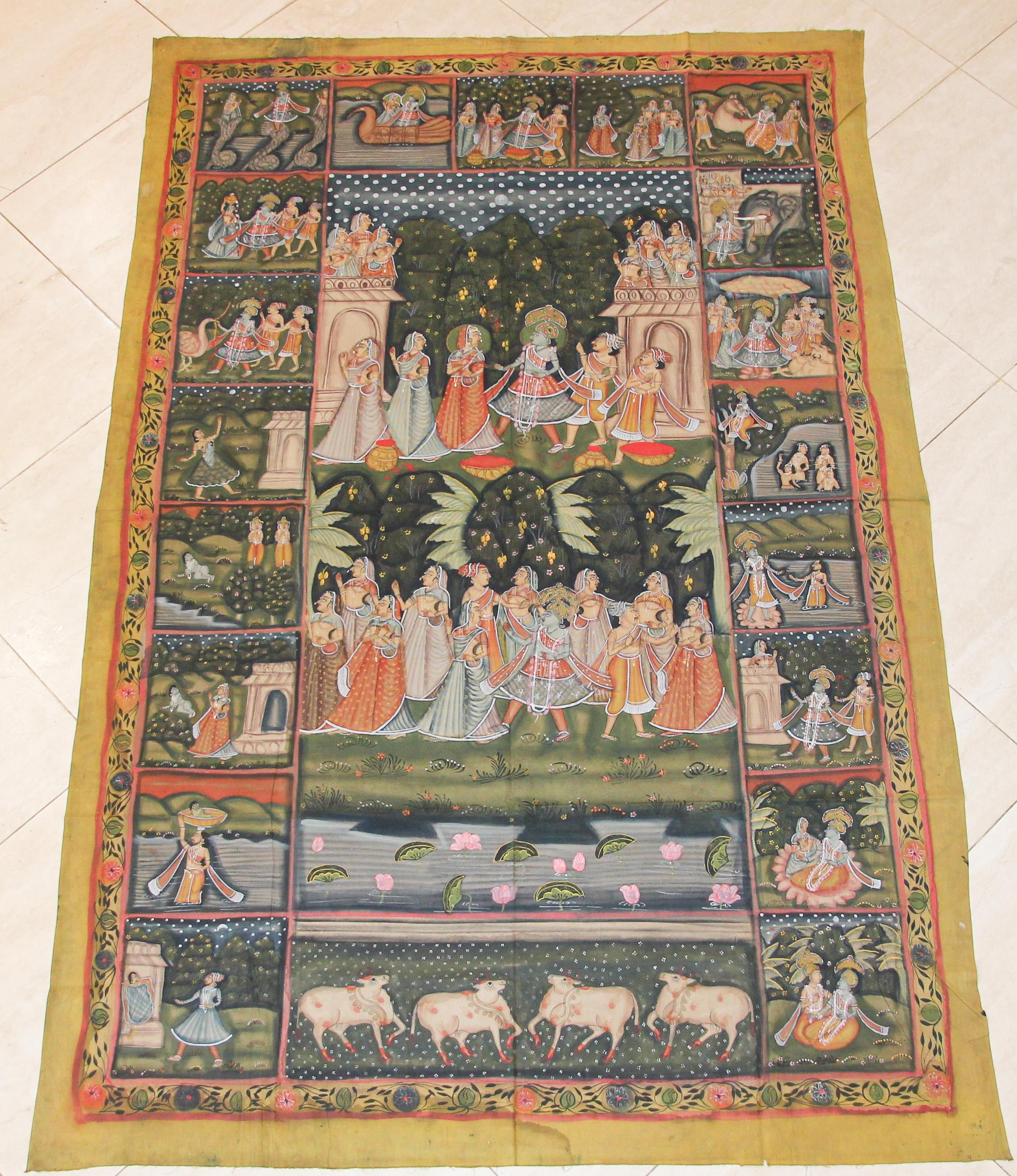 A large Pichhavai painting depicting Krishna, represented in multiple places with female Gopis dancing and offering, great colors, the composition is enclosed in a lush green forest and the colors of the dresses in yellow and oranges play off