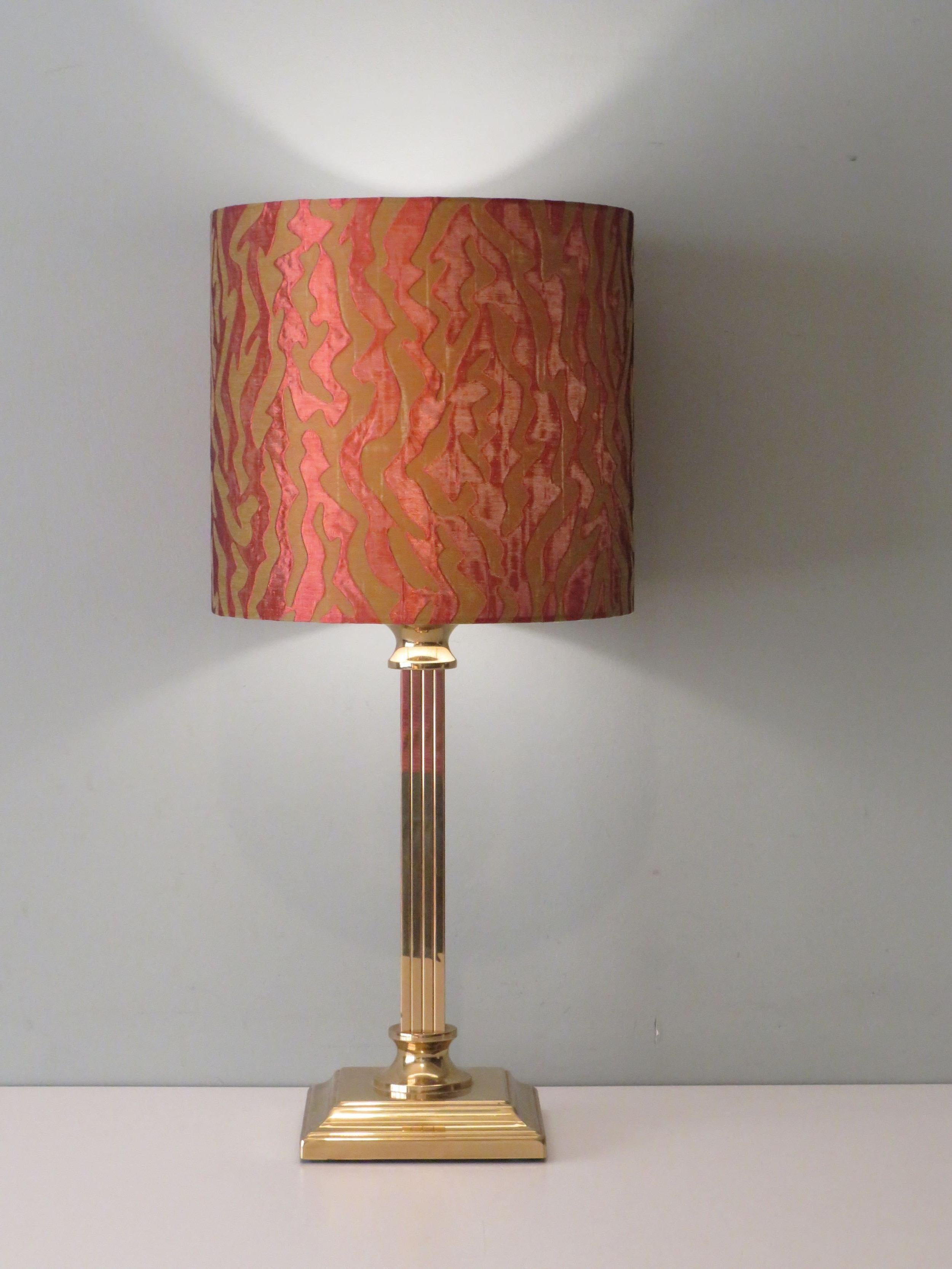 This beautiful sleek brass table lamp is equipped with a new,
custom lampshade in jacquard fabric.
The lamp is equipped with 1 E 27 fitting, gold-coloured cord, gold-coloured on and off button and plug.
Dimensions lamp base: H 44 cm L 17.5 cm and