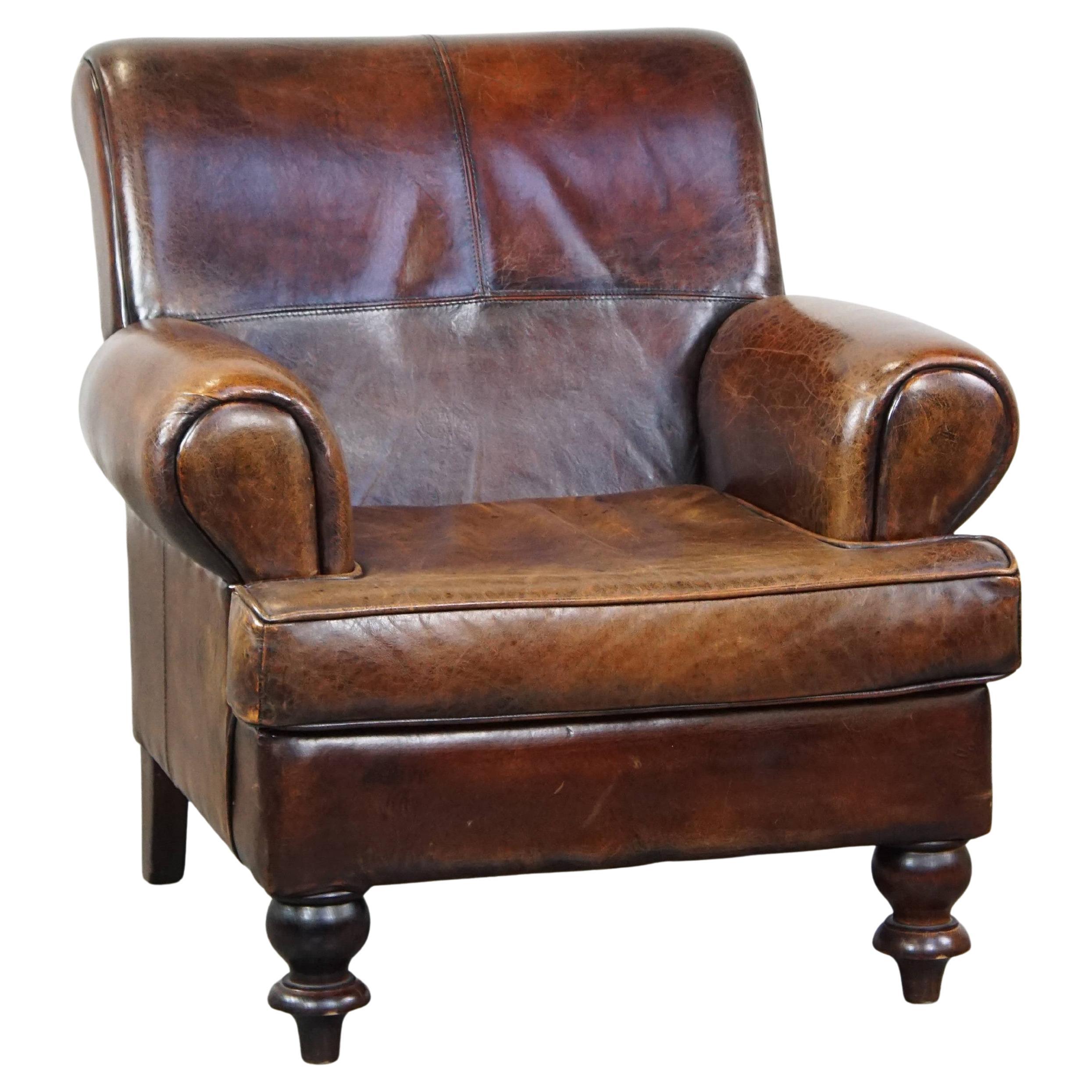 Large, comfortable sheepskin armchair in good condition, with beautiful colors