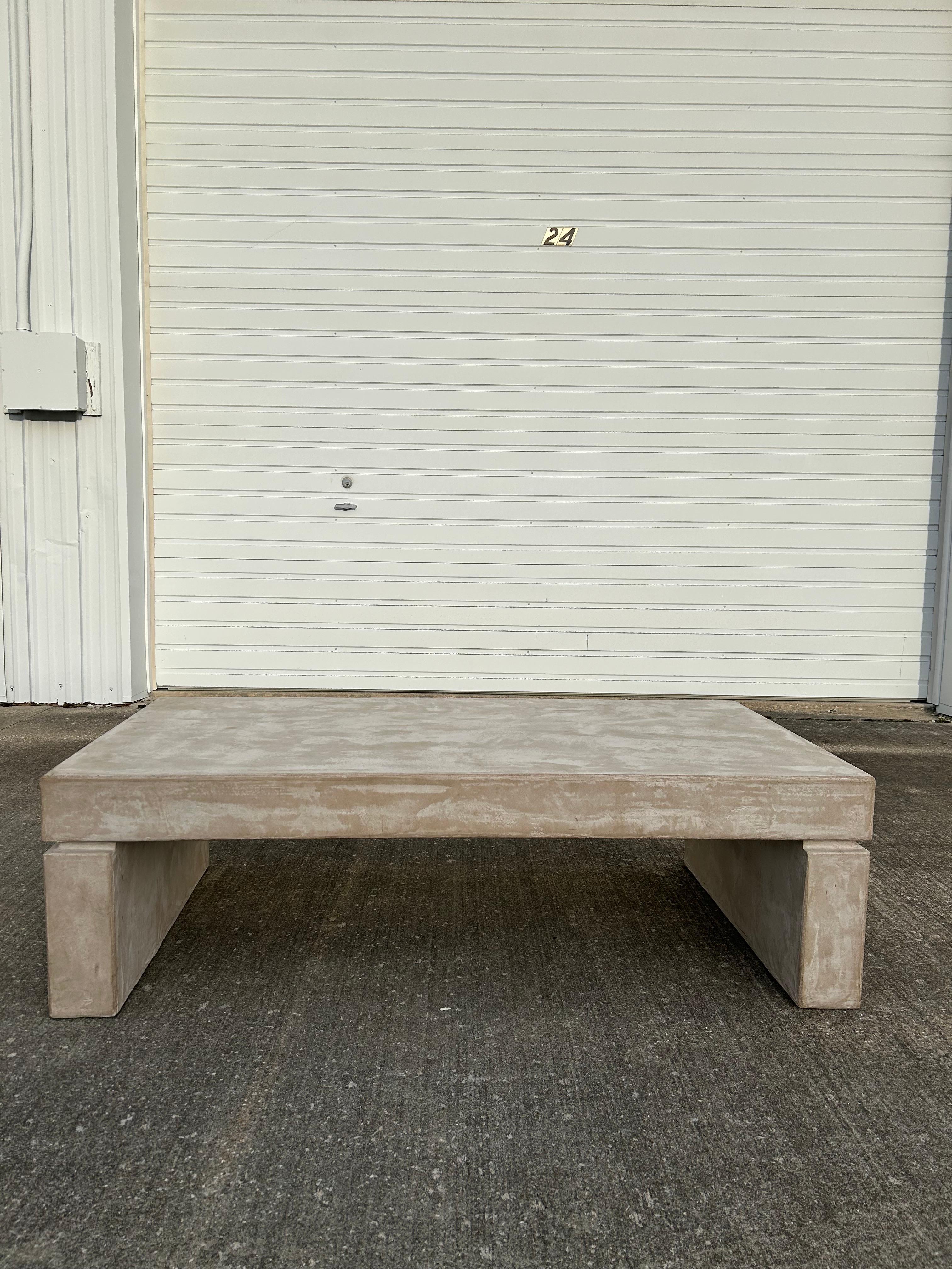 Beautiful and large Vintage PostModern Concrete Finish Composite Plaster Coffee Table. This table would be a great addition to your modern furniture style and home. It is in great condition and only has one small pink mark, see last picture. 