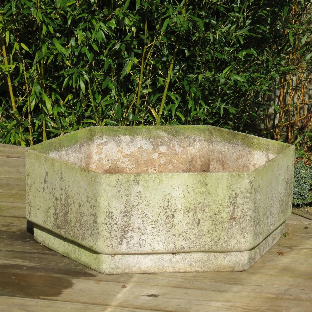 Wonderful planter made from concrete fibre. Hexagonal shape. In good vintage condition and very nicely patinated.
Dates from the 1970s
Designed by Willy Guhl, manufactured by Eurostone Swiss

Measures 61cm wide (flat side to flat side)
69cm wide