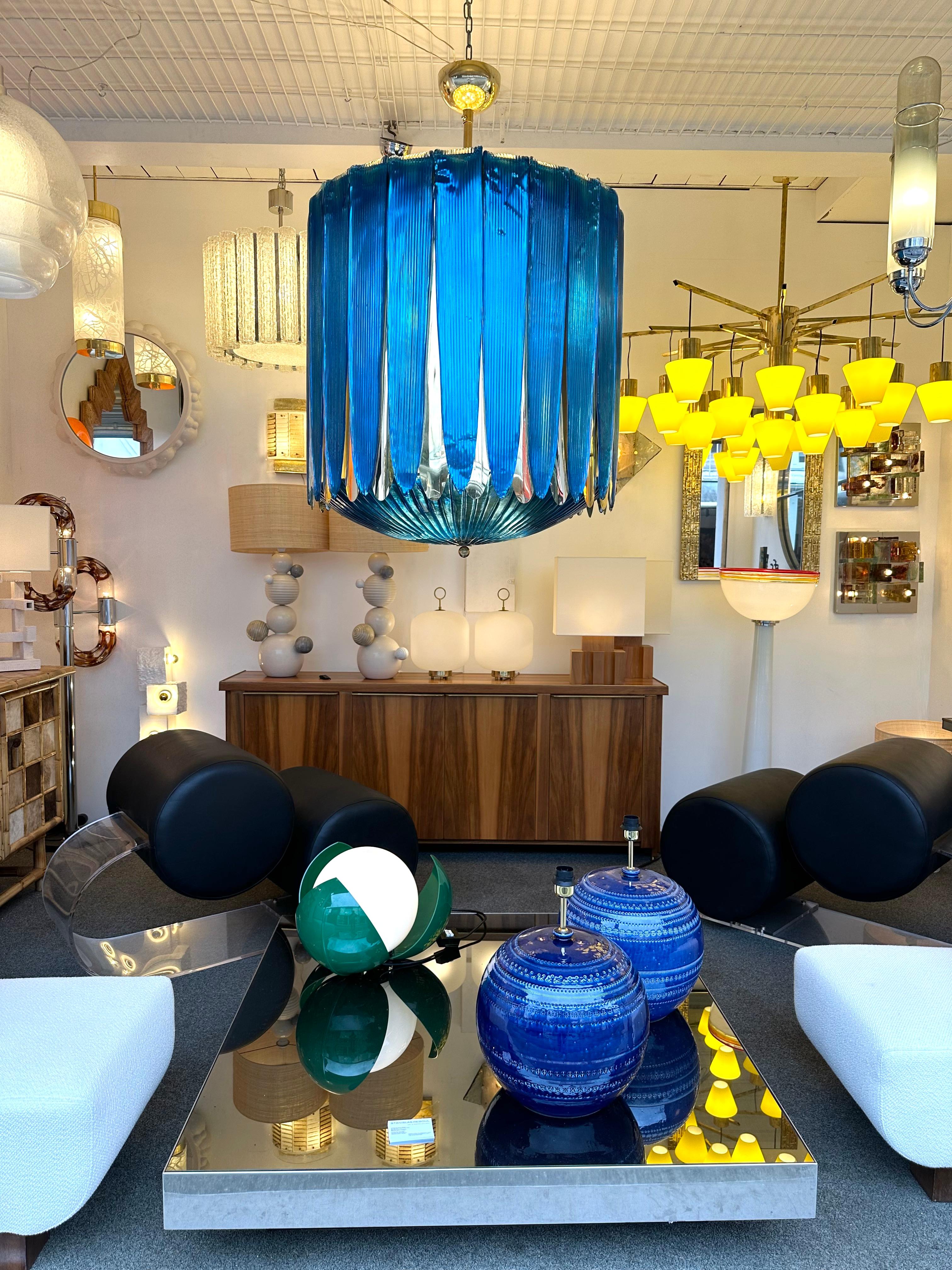 Large Balloon chandelier ceiling pendant light lamp with large blue Murano glass blade and brass blade. High quality glass. Contemporary work from a small italian artisanal workshop. In the mood of Mid-Century Modern Space Age Hollywood Regency,