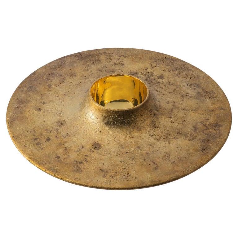 Gritty and glittering in texture, sensitive and witty in form, the CYMBAL BOWL is yearningly playful. 

The spread of CYMBAL's surface creates a delightful dispersion of weight. The contrast between the solid form, and the artful void within it