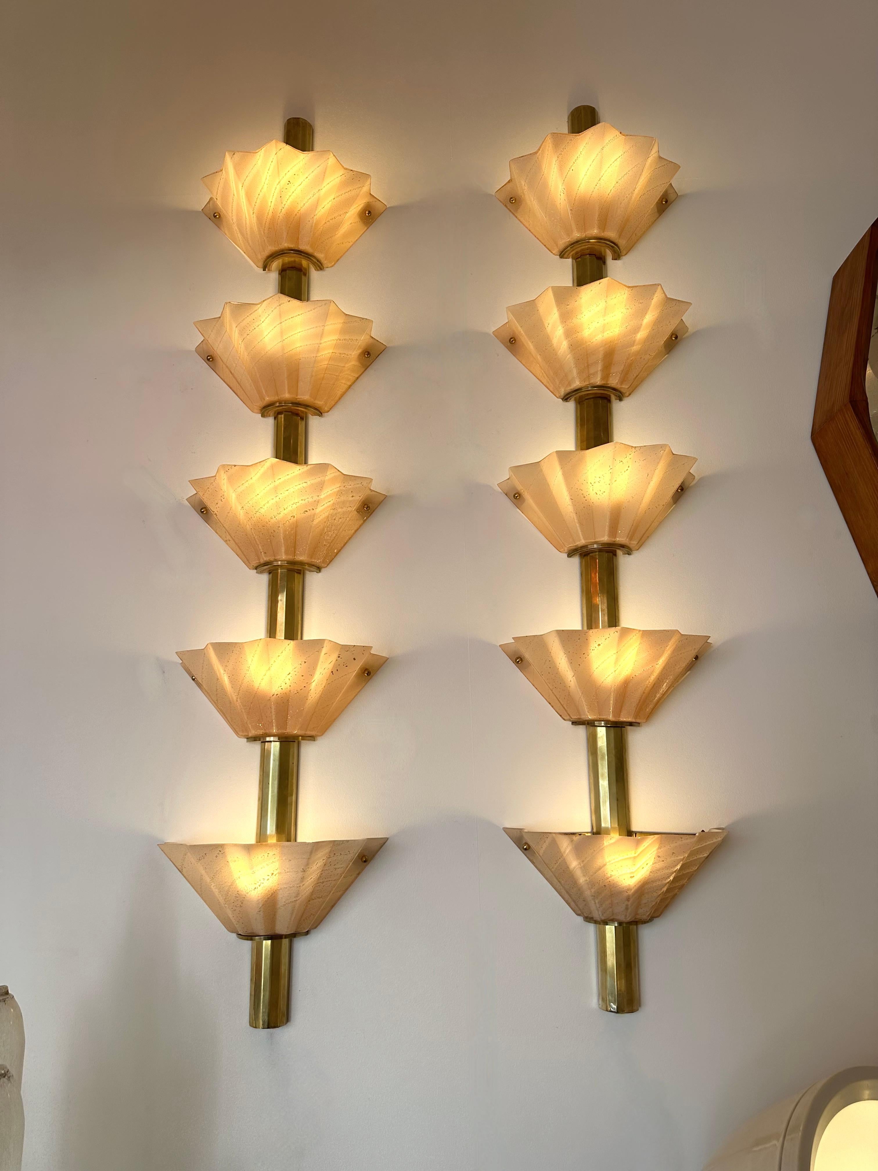 Large tall Pair of Contemporary pink Murano glass with gold leaf and brass wall lights lightning lamps sconces. Contemporary work from a small artisanal italian design workshop. In the mood of Mid-Century Modern, Hollywood Regency, Venini, Mazzega,