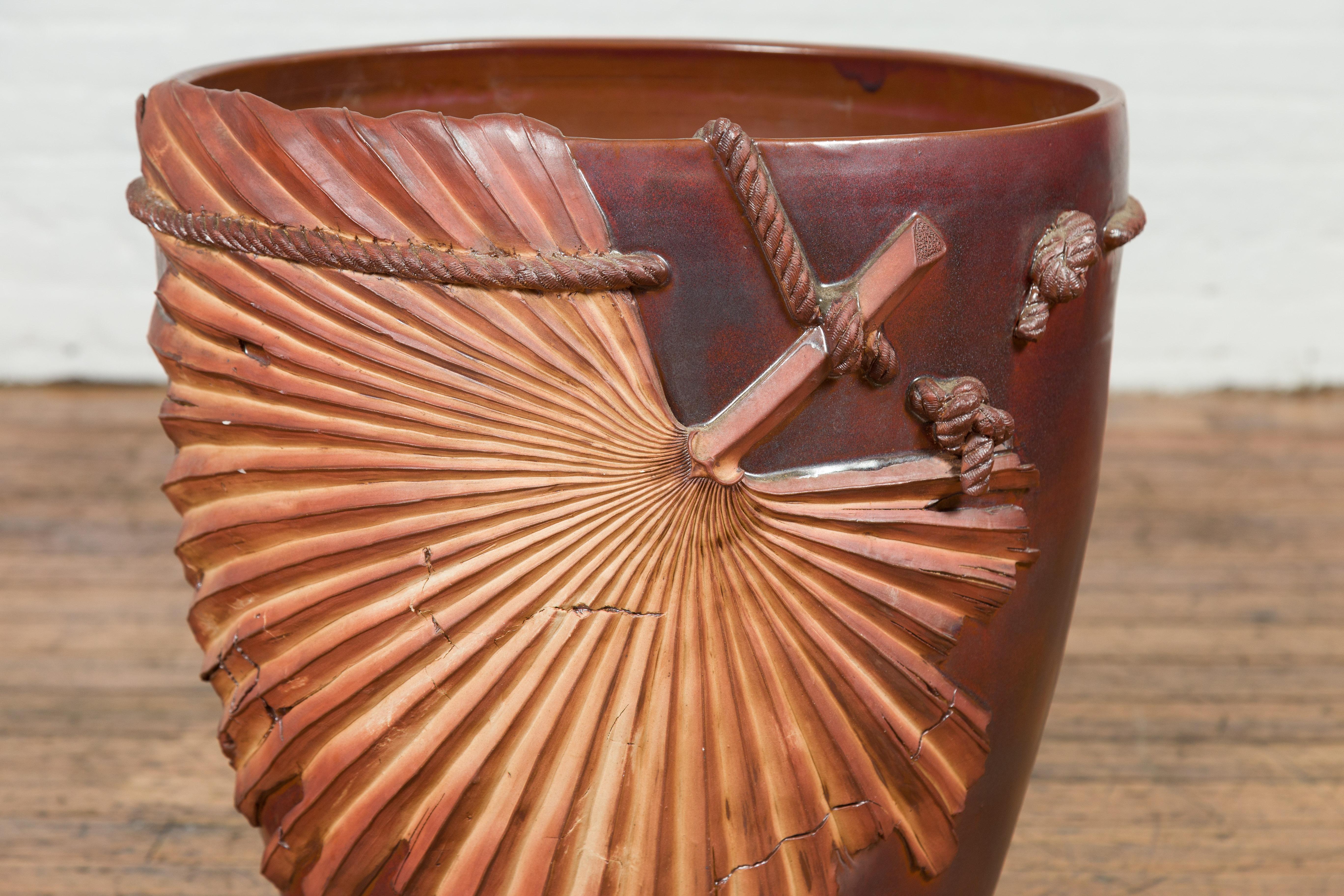 Ceramic Large Contemporary Thai Garnet Toned Planter with Palm Leaf and Rope Motifs For Sale