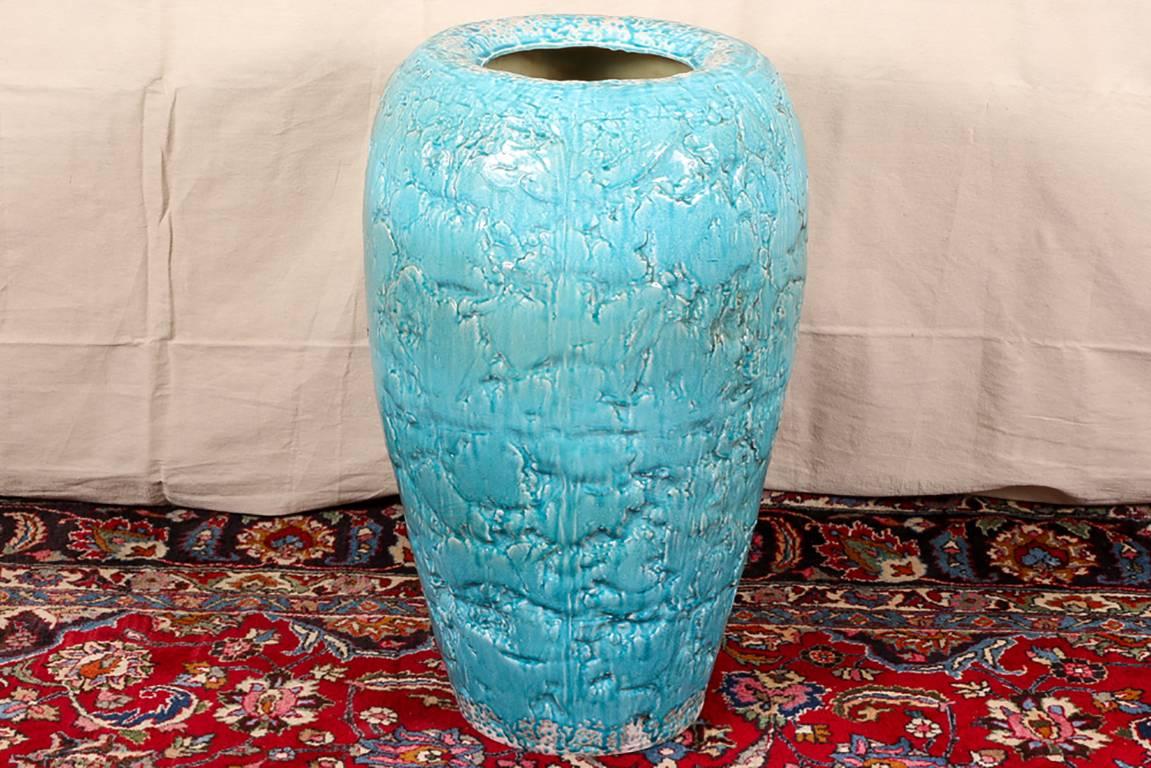 Large contemporary turquoise glazed pottery vase, textured surface with a variegated glaze.

Condition: Expected wear and signs of use including some light surface scratching.