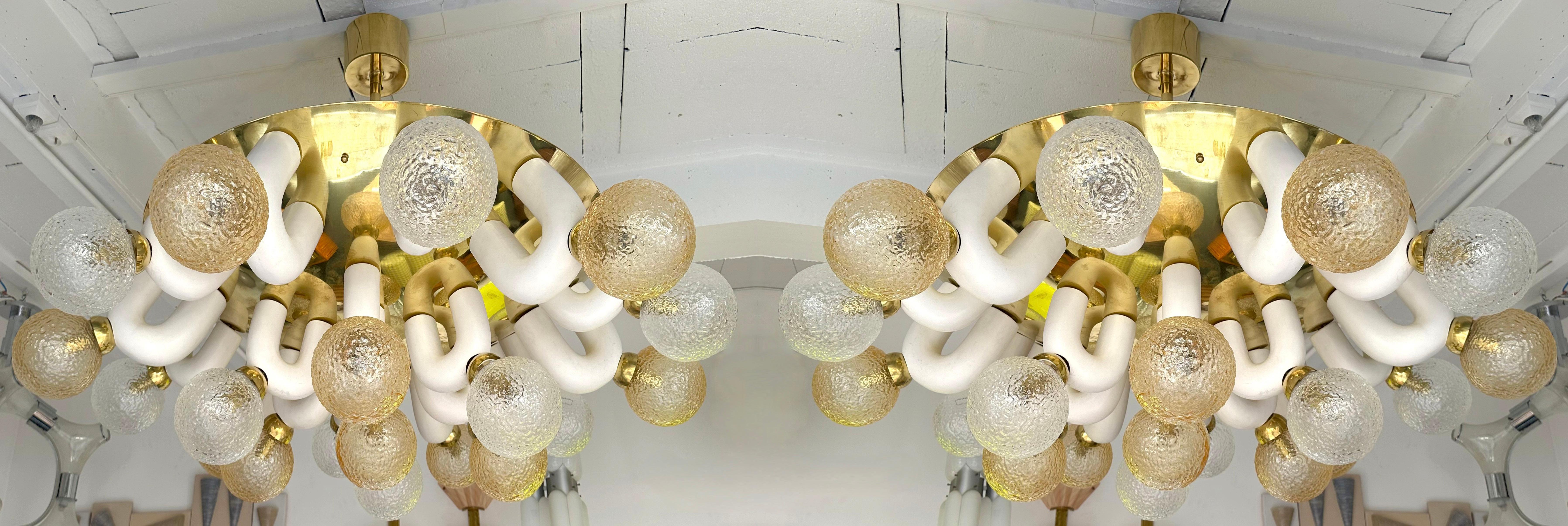 Chandelier ceiling pendant light lightning lamp in brass, white ceramic terracotta and textured transparent and yellow Murano glass. Contemporary work from a small italian artisanal workshop. Minor imperfections due to handmade artisanal work. In