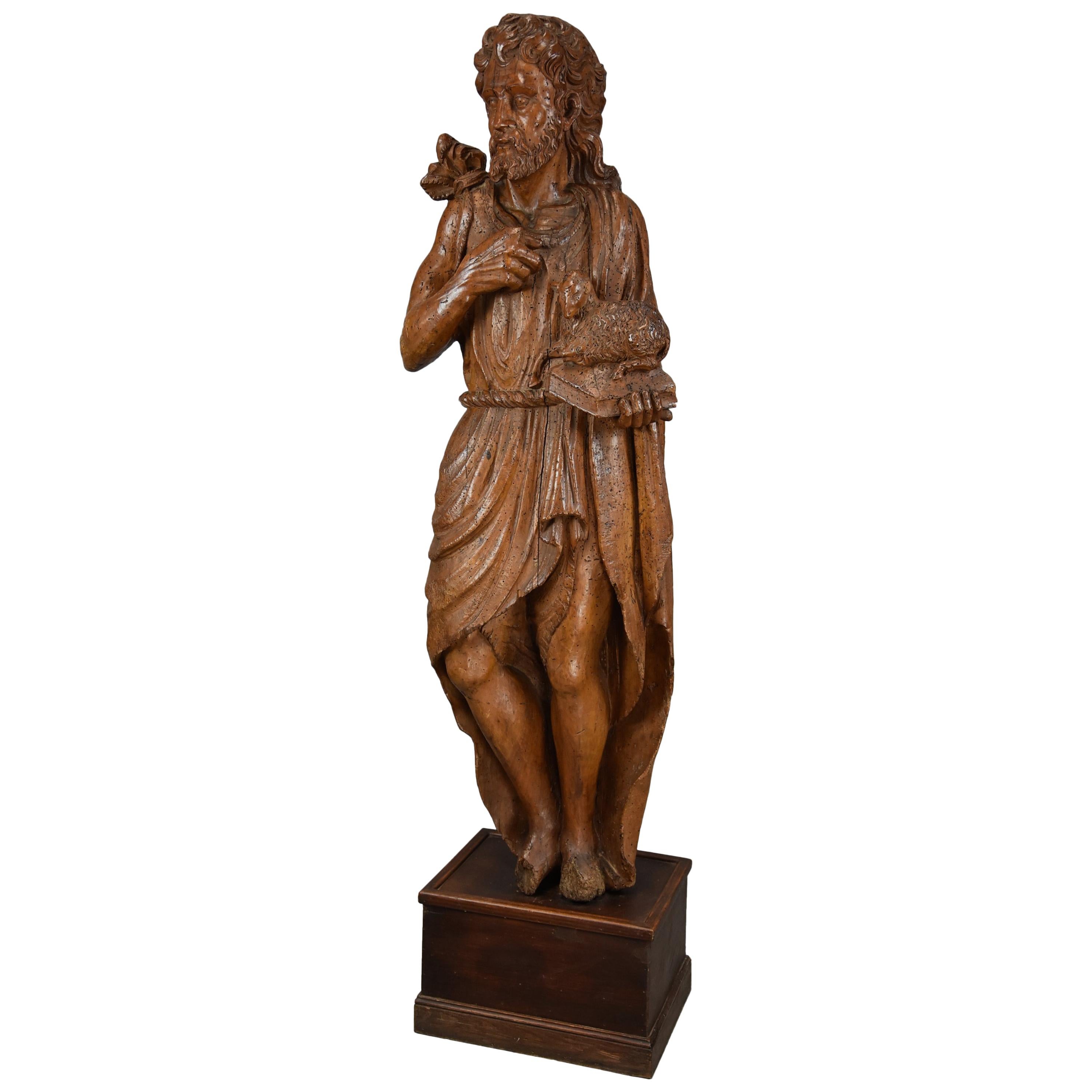 Large Continental 16th Century Carved Limewood Figure of St. John the Baptist For Sale