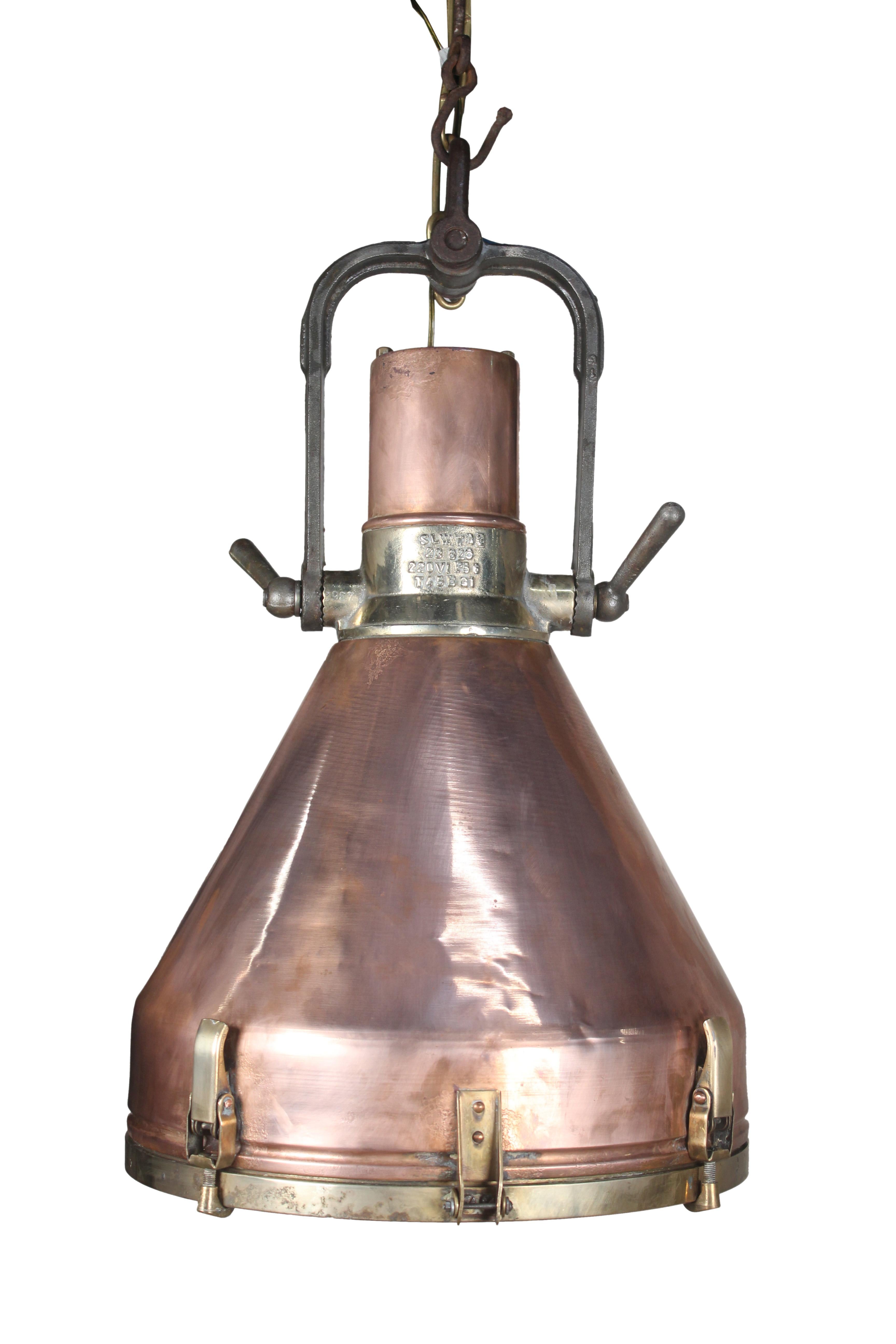 Large, magnificent and outstanding copper and brass ship's deck lights converted to pendant lights. Iron U-bracket. handles and shackle. Brass chain and canopy. Brass chain is 3' long and canopy measures 5.5