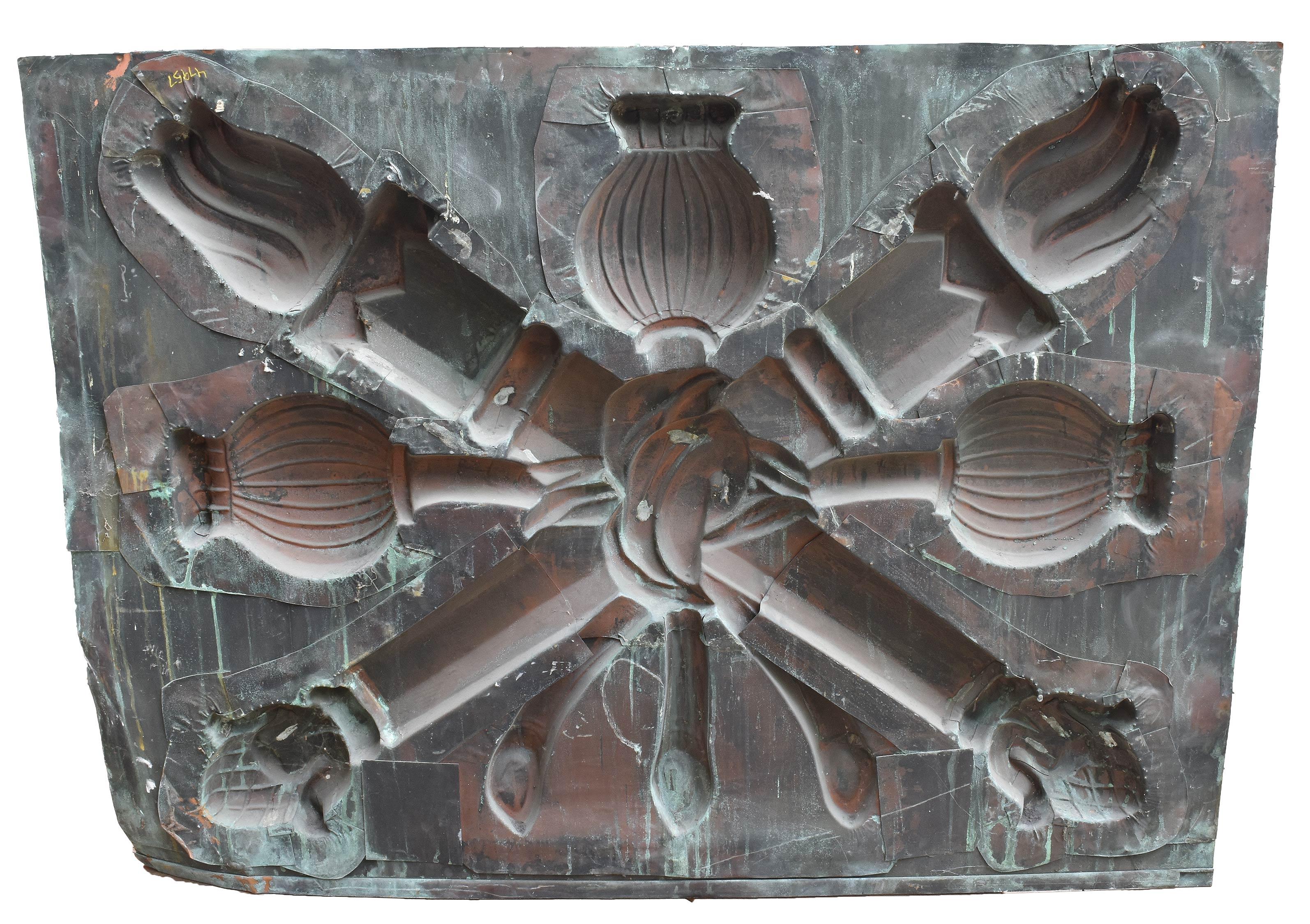 This large copper building panel, featuring torch imagery, will make any space stand out. With a projection of four inches from the wall, this piece maximizes its impact with high relief and visual clarity. A truly stunning work out art! Copper