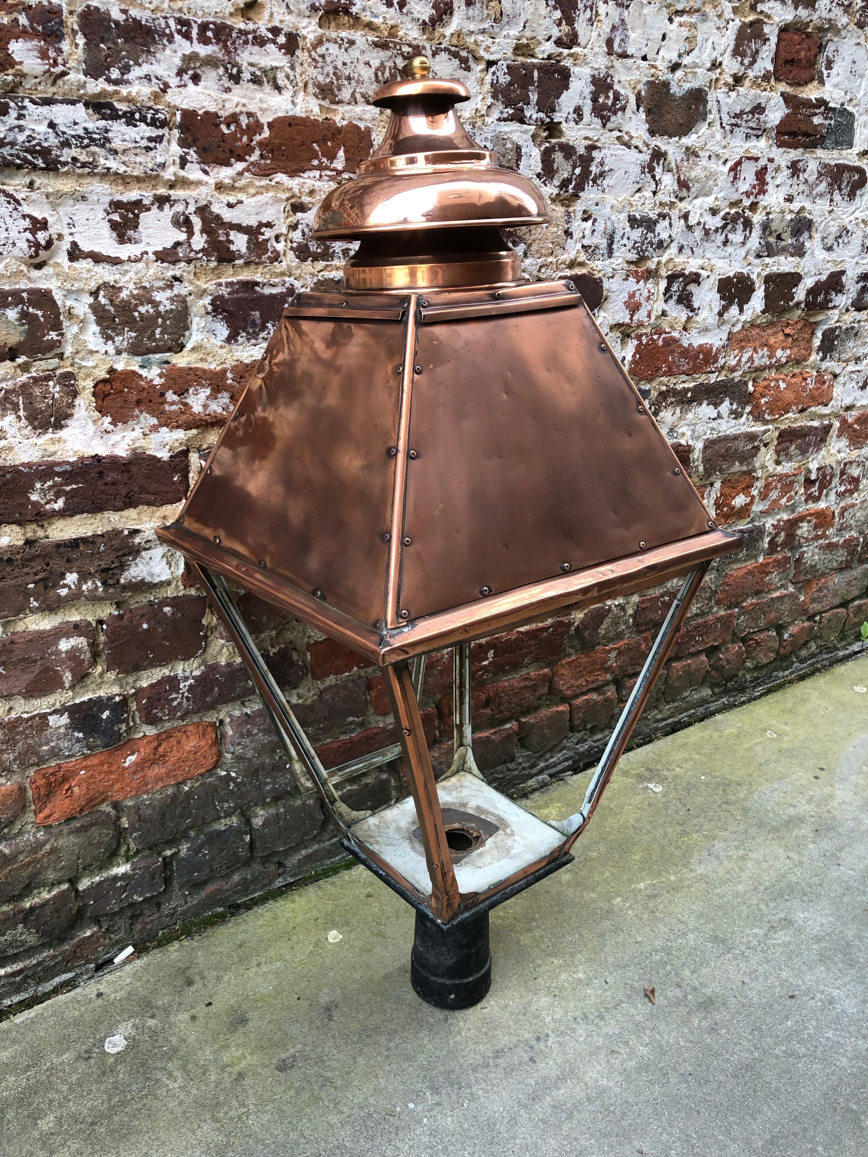 Large copper post lantern. Riveted with solder construction. Could be electrified or gas.