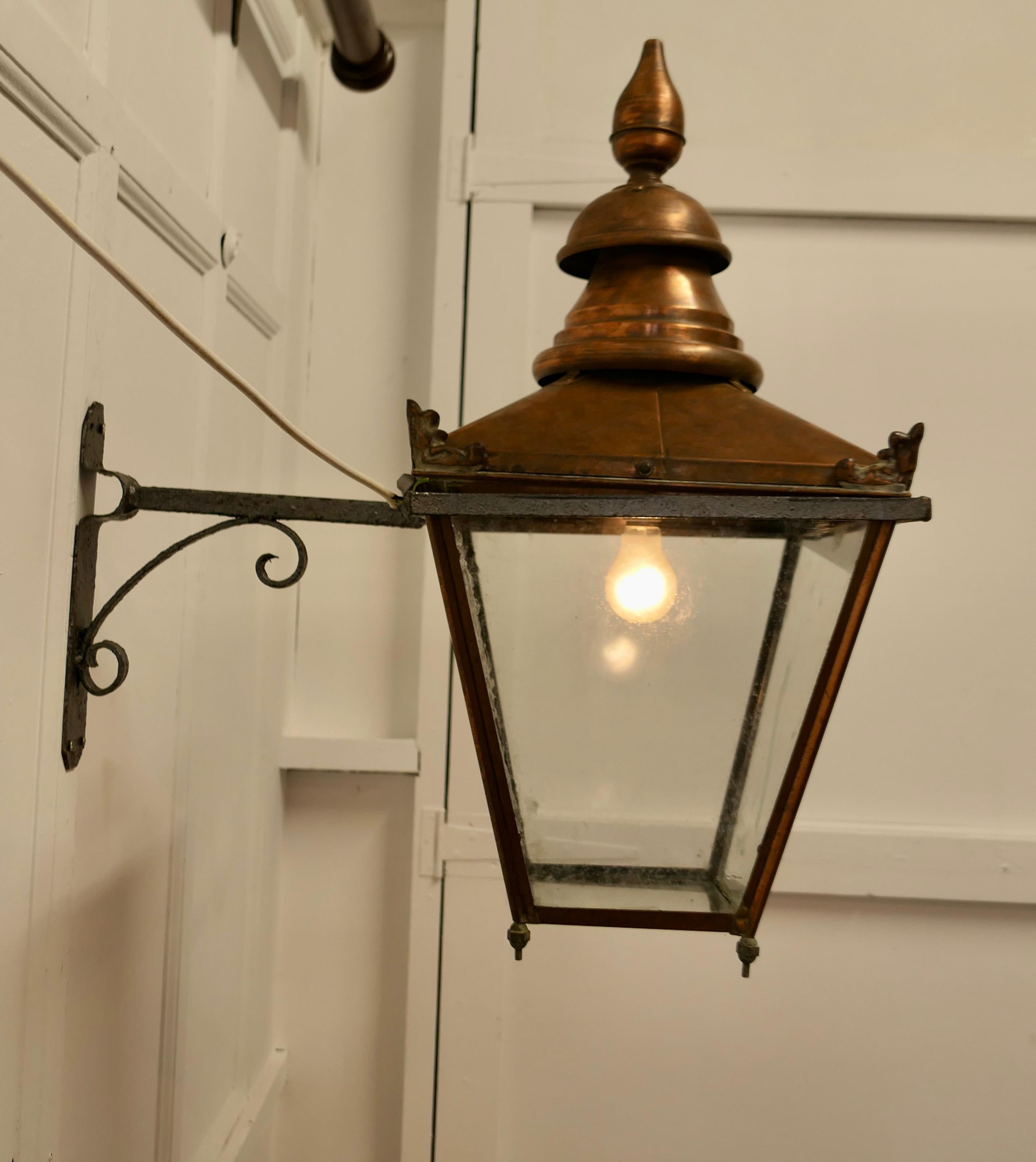 Early 20th Century Large Copper Wall Hanging Lantern    This is a Large Copper street light style 