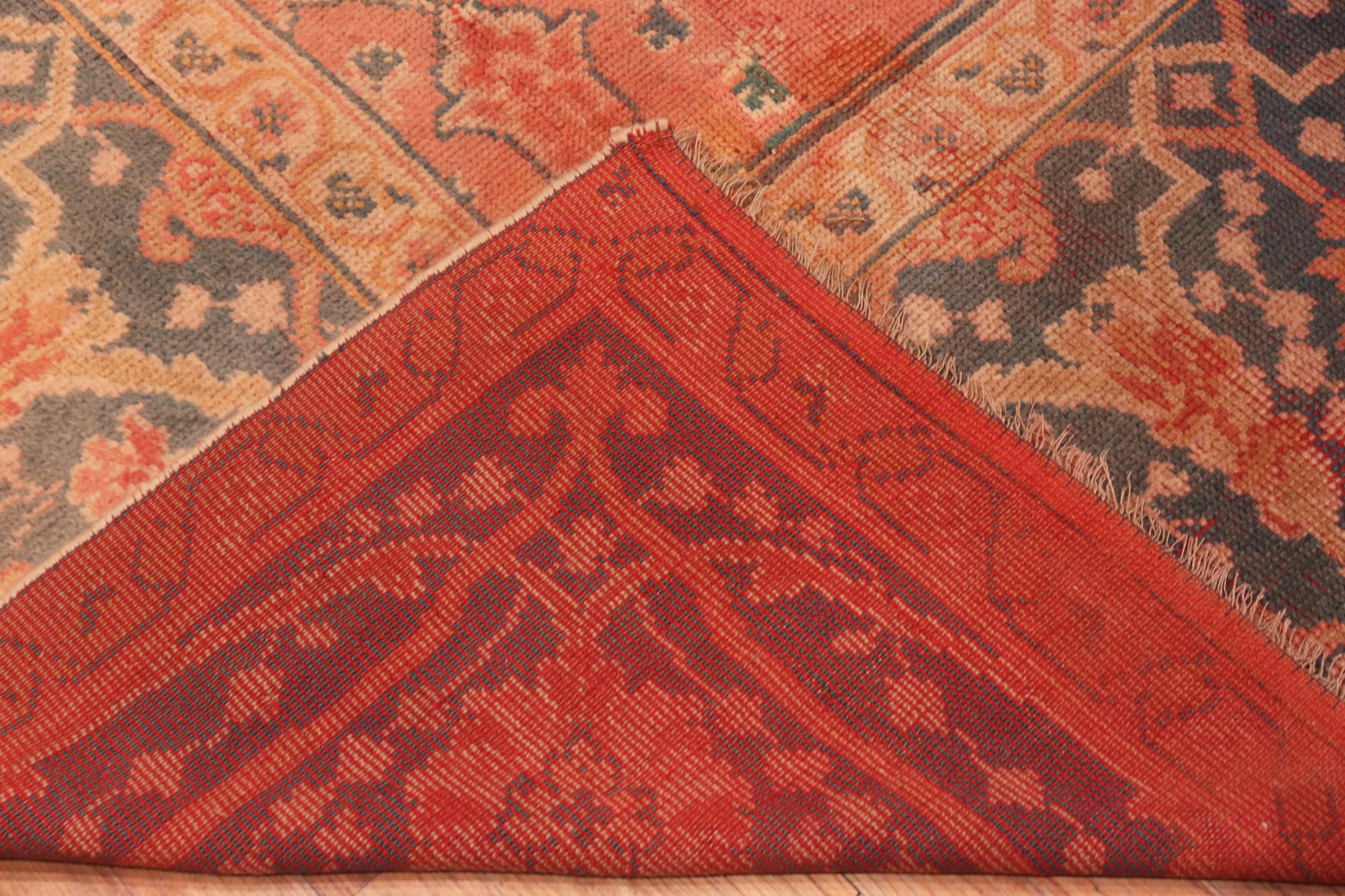 Hand-Knotted Coral Antique Turkish Oushak Rug. 12 ft 9 in x 16 ft 2 in For Sale