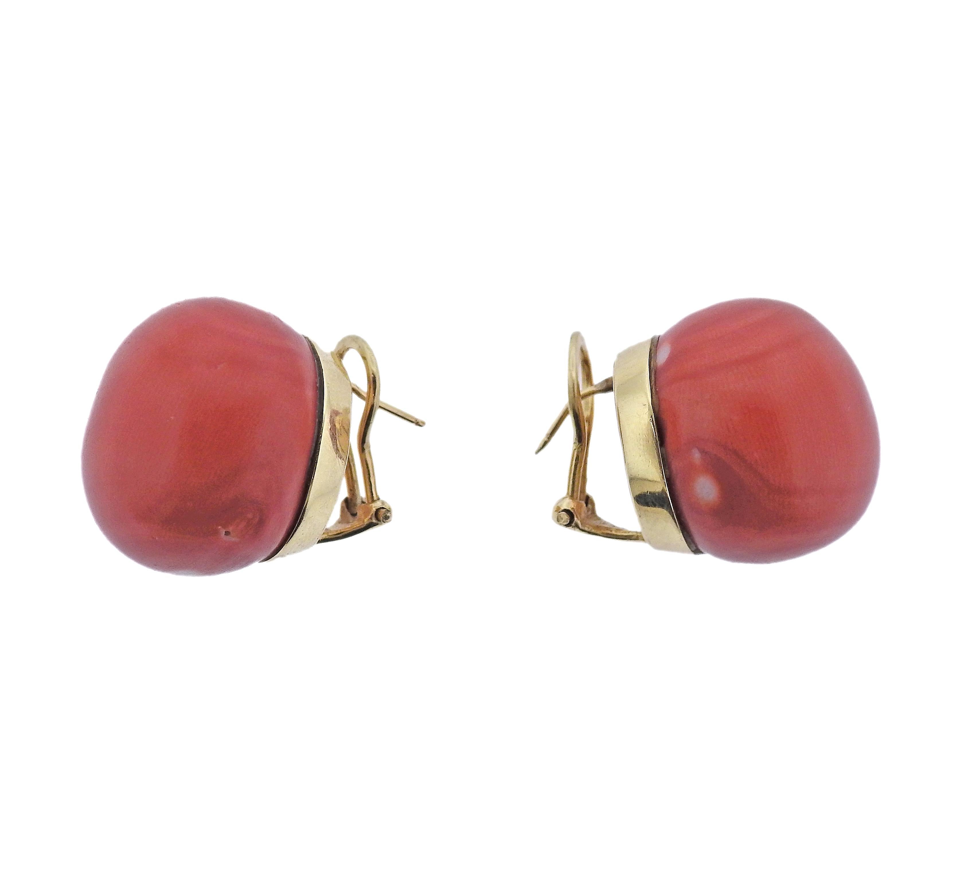 Pair of large vintage 14k gold earrings with 21mm in diameter coral gems. Marked 14k on backs. Weight - 26.4 grams.