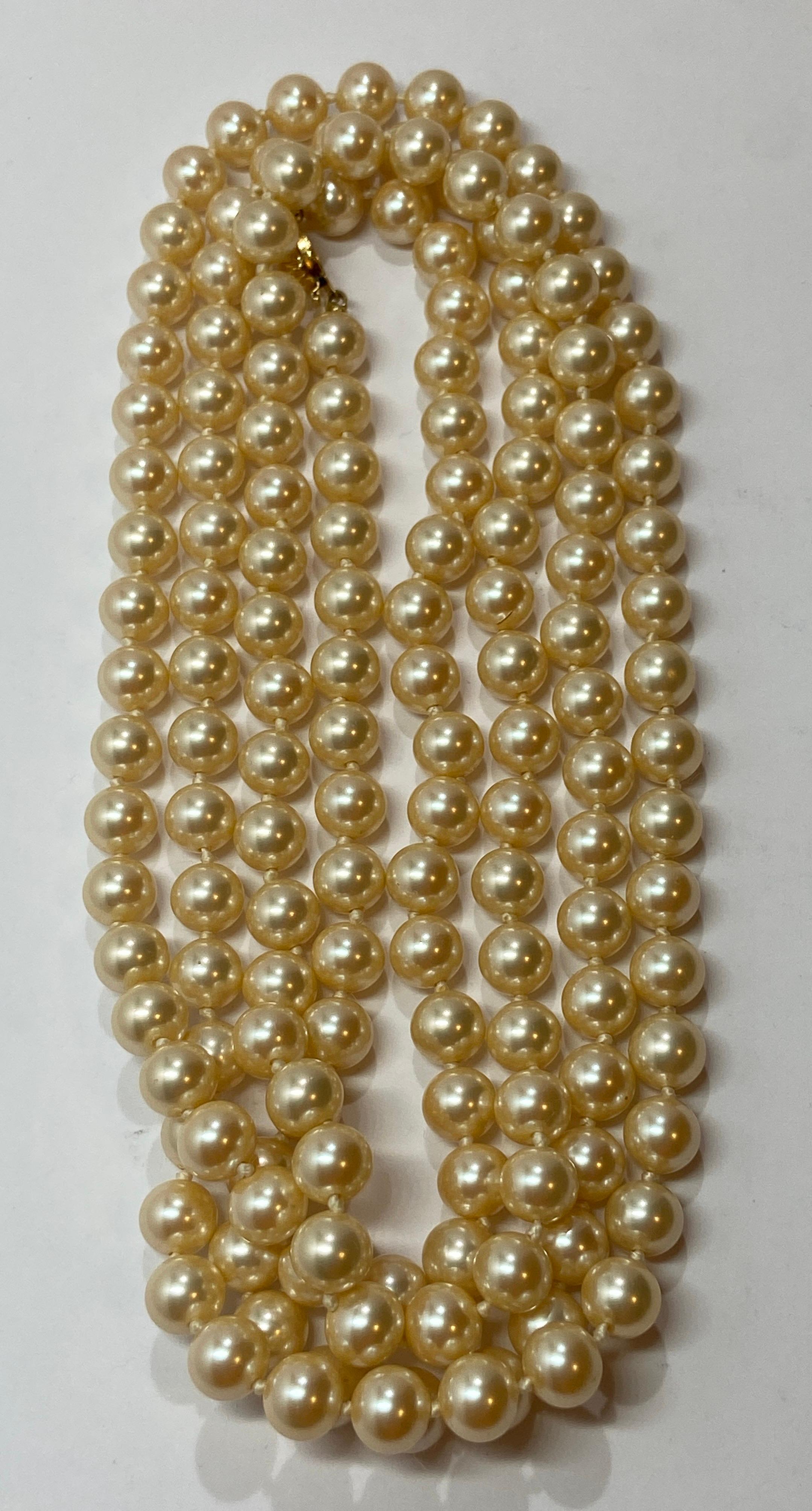 Marvella Elegantly Hand-Knotted Pearl with Polished Gold Hardware Clasp Necklace In Good Condition For Sale In New York, NY