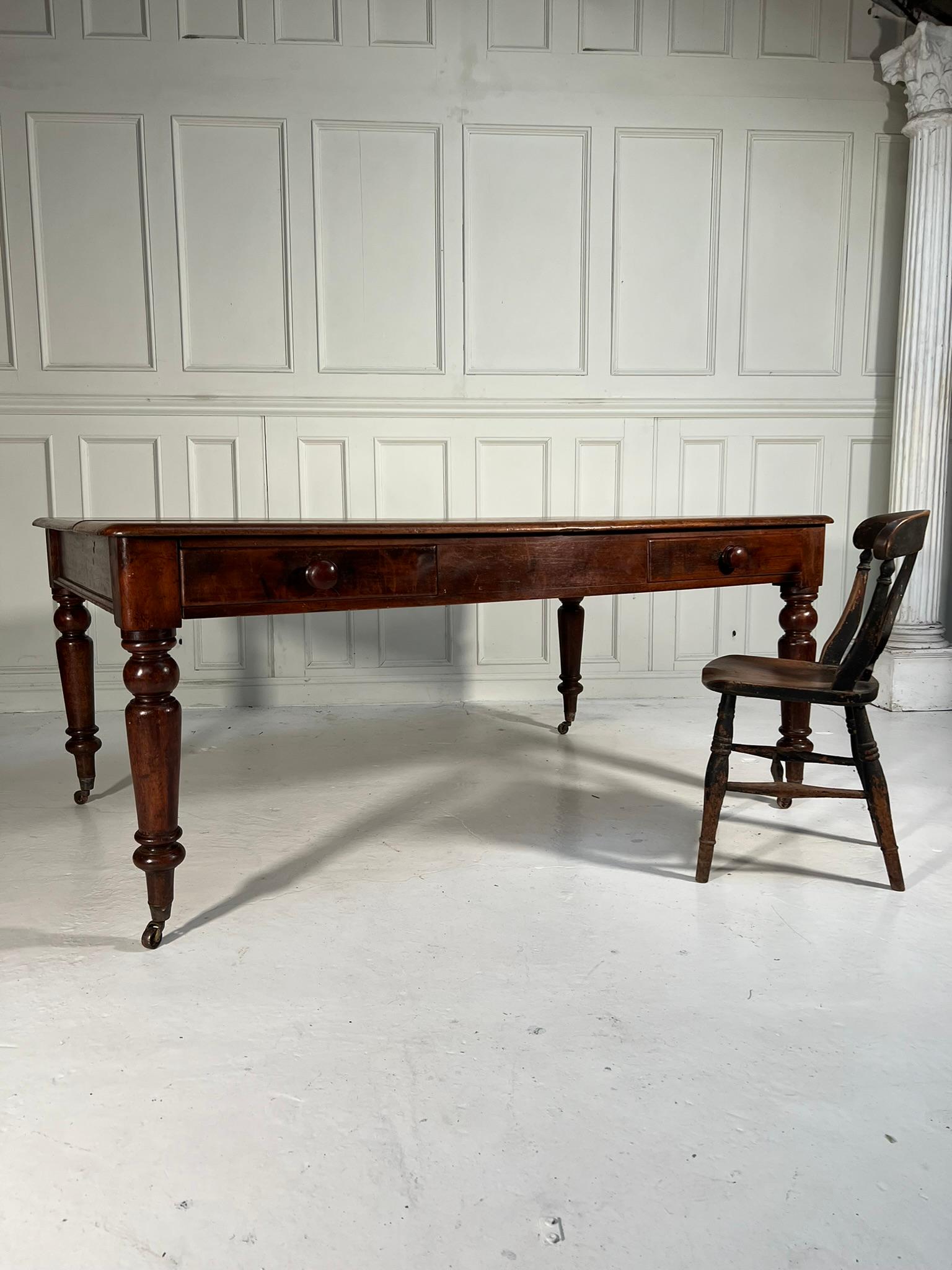 Large country house prep table.

This would have originally been used as a prep table in a large country house kitchen but will work equally as well as a dining table.

Will seat 8 comfortably.

Raised on brass castors with turned legs.

The top
