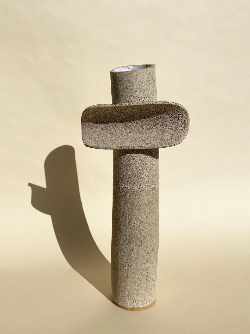 Large crackled TOTEM by Olivia Cognet
Materials: Clay
Dimensions: H around 55-60 cm

Available in different sizes, sets available

TOTEM
Vases, lamps and sculptures with graphic forms, made from clay that gives them a rough look..

Each of