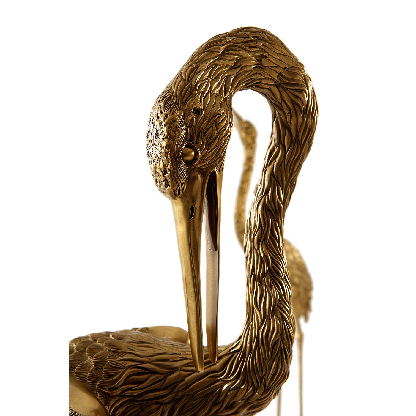 gold crane statue