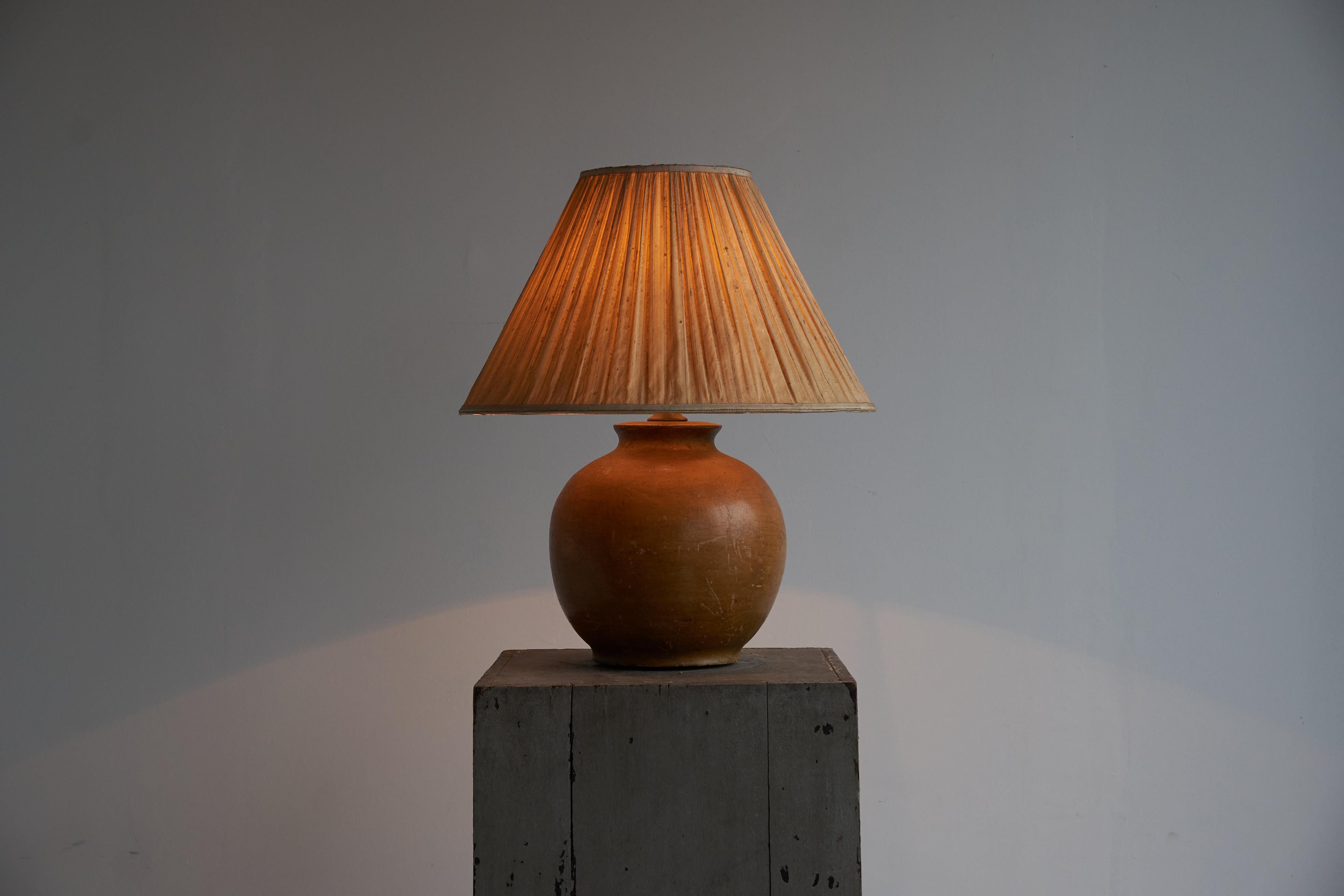 Large Craquelé Studio Pottery Table Lamp with Original Shade 1950s

This is a magnificent and rare large mid-century studio pottery table lamp with a mesmerizing craquelé finish. Viewed up close it shows a wonderful landscape of craquelé and patina.