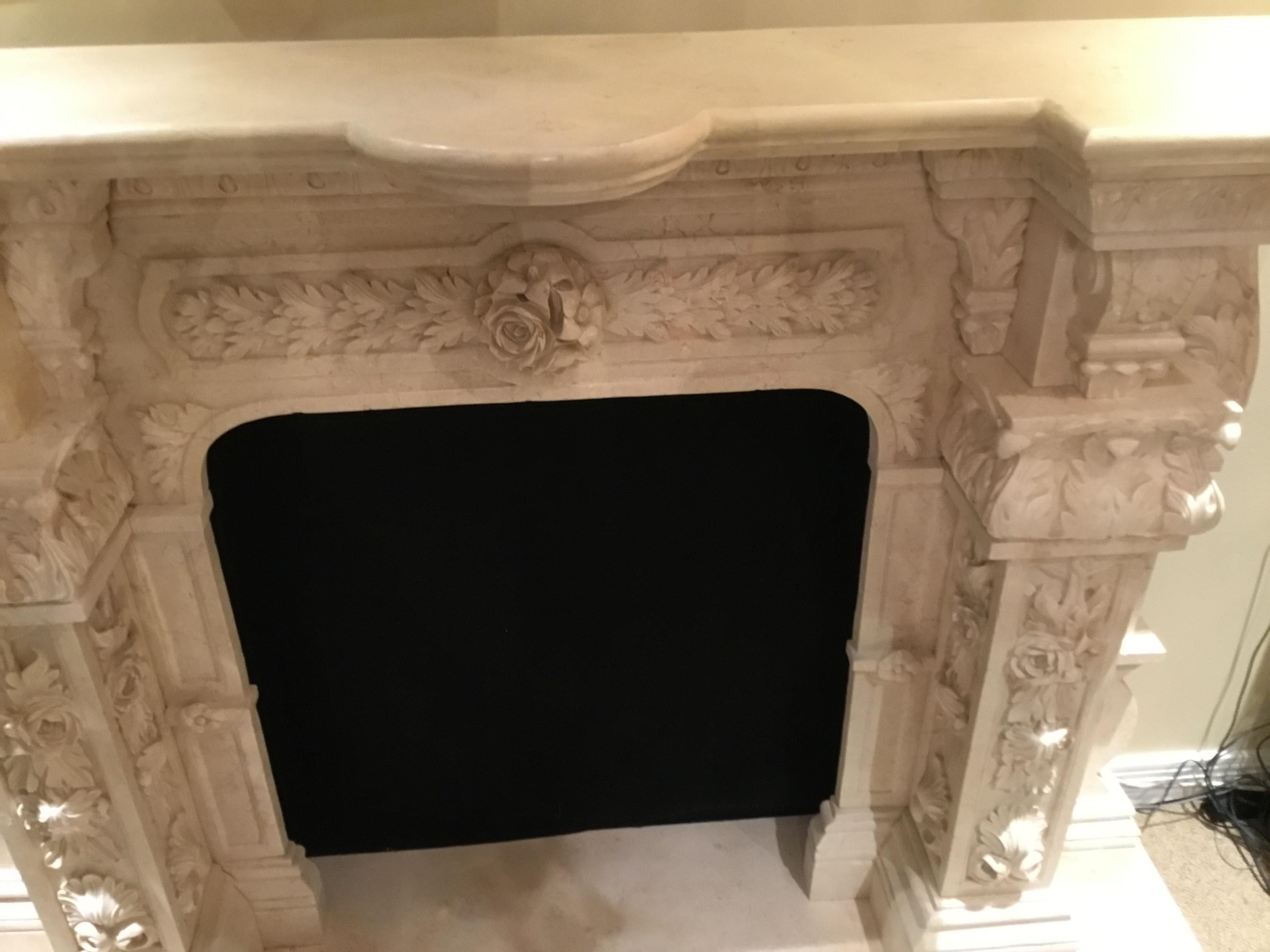 Large Cream Marble Mantel, French Style with Hand Carving with Floral/Foliate In Excellent Condition In Houston, TX