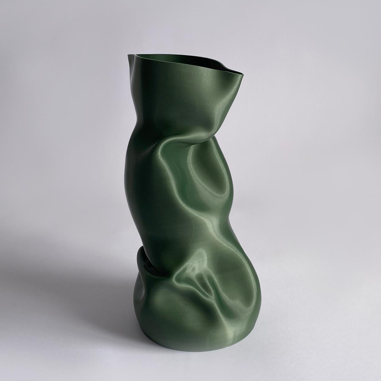 3D-printed in bioplastic and hand-shaped, the Crumpled Vase combines digital precision with expressive craftsmanship. Its sculptural form and delicate texture make each piece a one-of-a-kind creation, individually molded by the artist’s hands.

Made