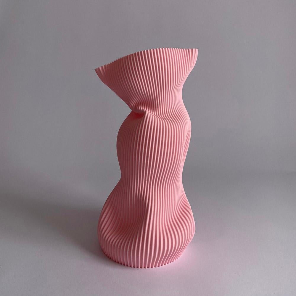 3D-printed in bioplastic and hand-shaped, the Crumpled Vase combines digital precision with expressive craftsmanship. Its sculptural form and delicate texture make each piece a one-of-a-kind creation, individually molded by the artist’s hands.

Made