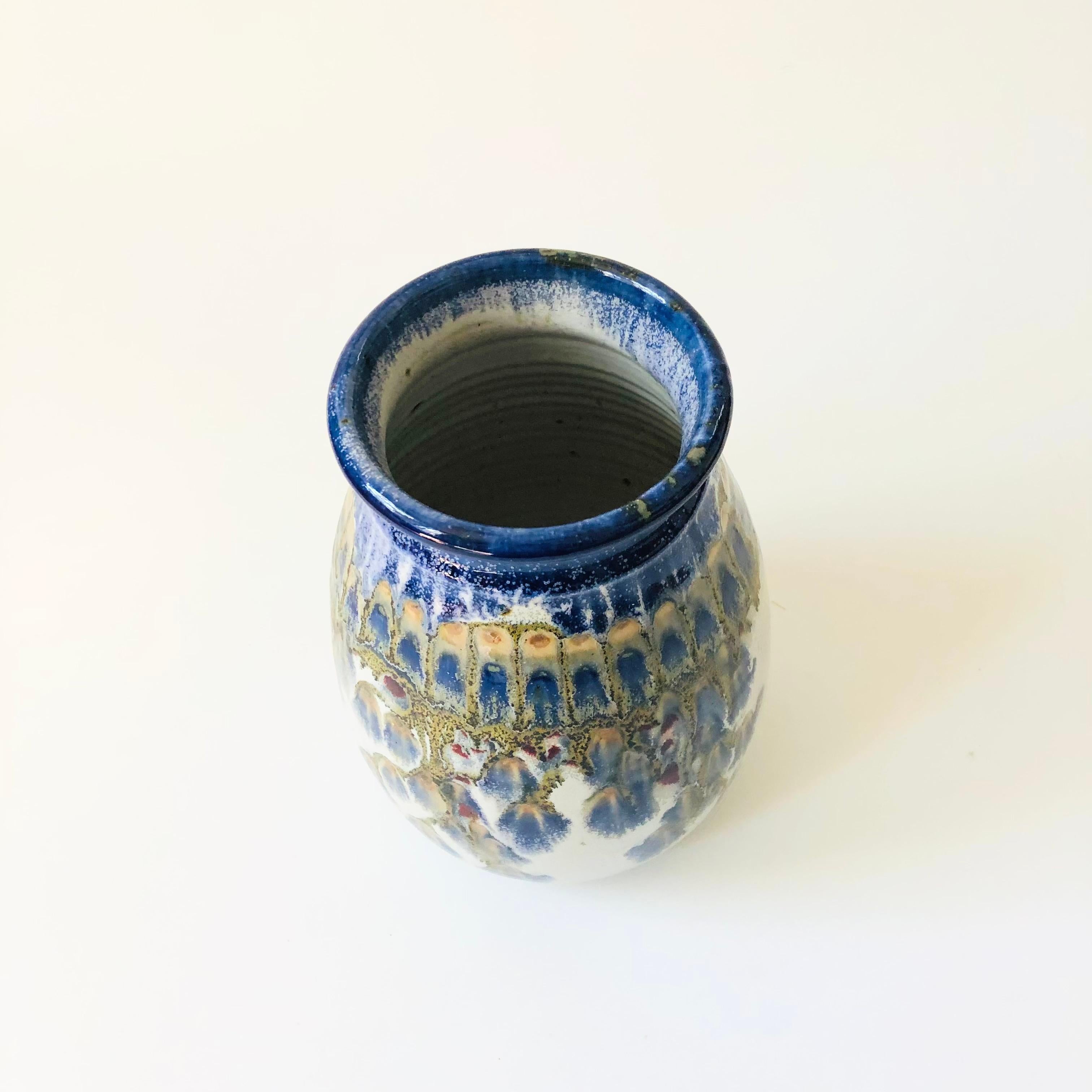 A large vintage studio pottery vase made by Barry Crutchfield of Washington. Barry Crutchfield's pottery has been shown in art shows throughout the country and he continues to make beautiful pieces out of his studio in Washington today. This piece