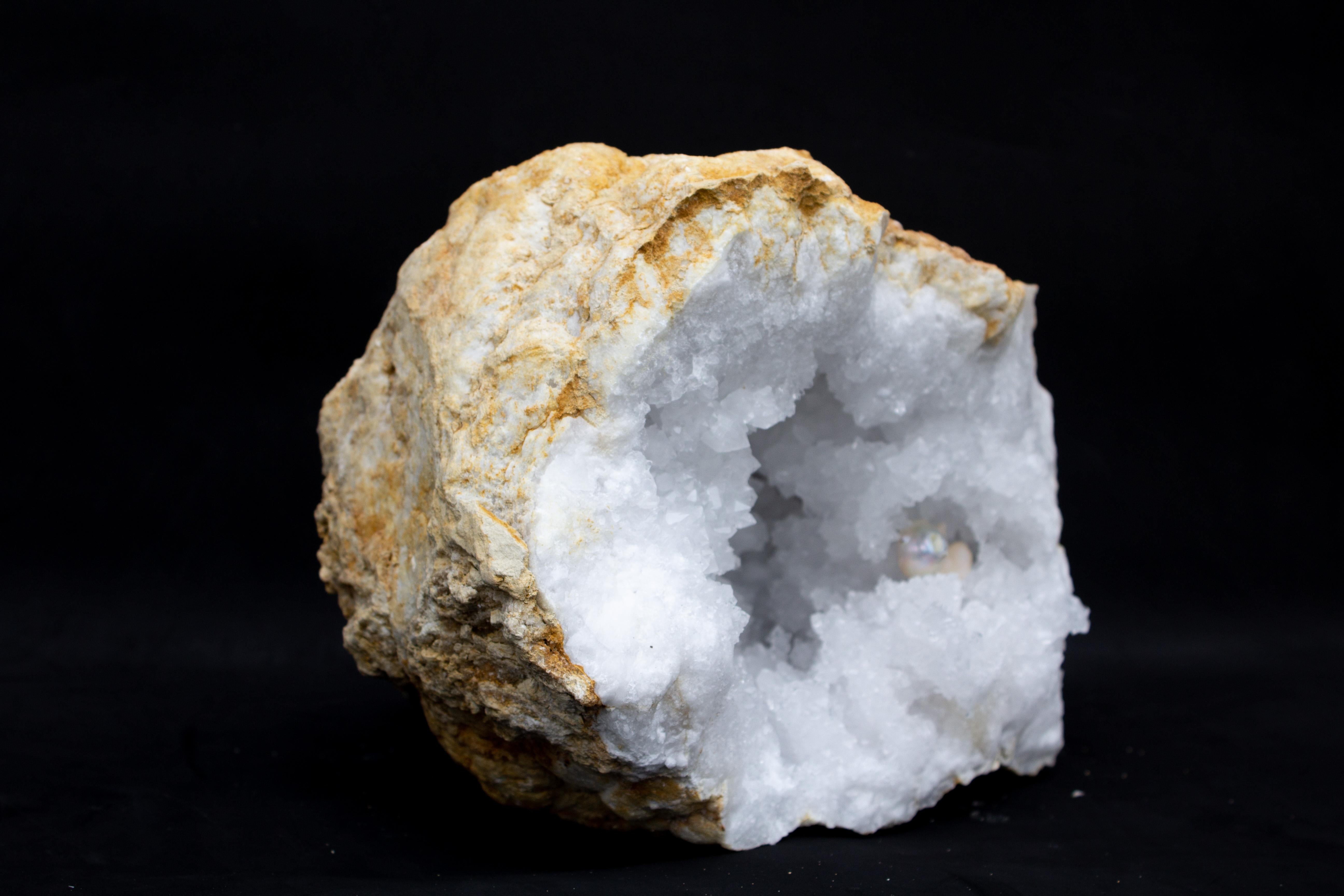 Prehistoric Large Crystal Quartz Geode with a Baroque Pearl For Sale