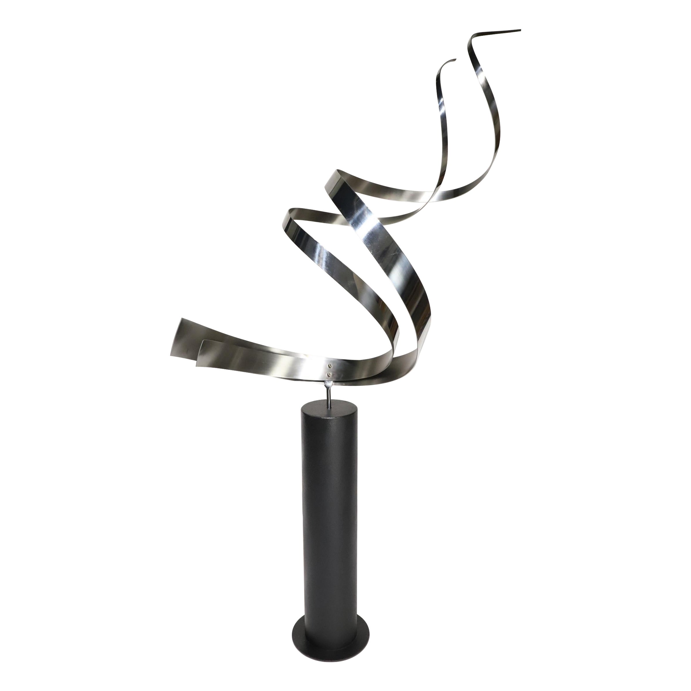 Scultura da pavimento a vortice grande di Curtis Jere