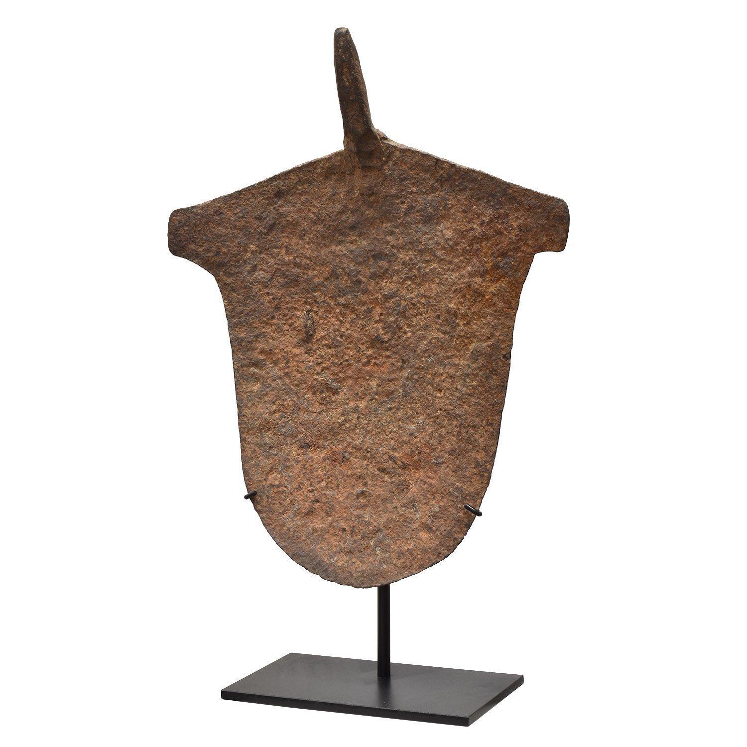 Extra Large Curved Hoe Currency

Angas, Nigeria
Early 20th century
Iron
20.5 x 16 in. / 52 x 41 cm
Height on custom display stand: 25 in. / 64 cm
Weight: 7.2 pounds / 3.3 kg
Combined weight with base: 14.3 pounds / 6.5 kg

The large currency forms