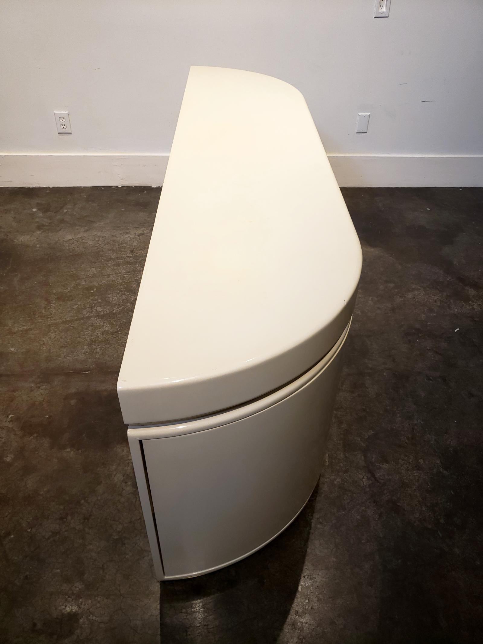 Brass Large Curved Lacquered Off-White Cream Credenza by J. Wade Beam, circa 1980