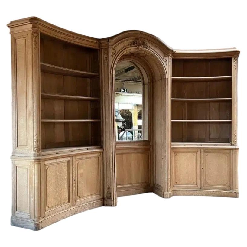 Large Curved Louis XV Style Oak Corner Library with Central Mirrored Panel For Sale