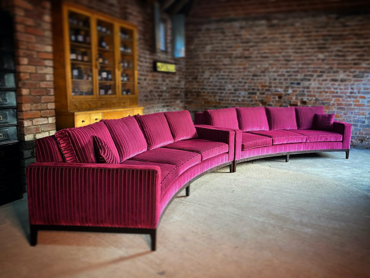 The best of the best, exceptional pair of sumptuous custom made Rosewood curved three seater sofas of the highest quality, standing at over 10 feet in length per sofa ( combined 20 feet in total) upholstered in the most luxurious magenta velvet with