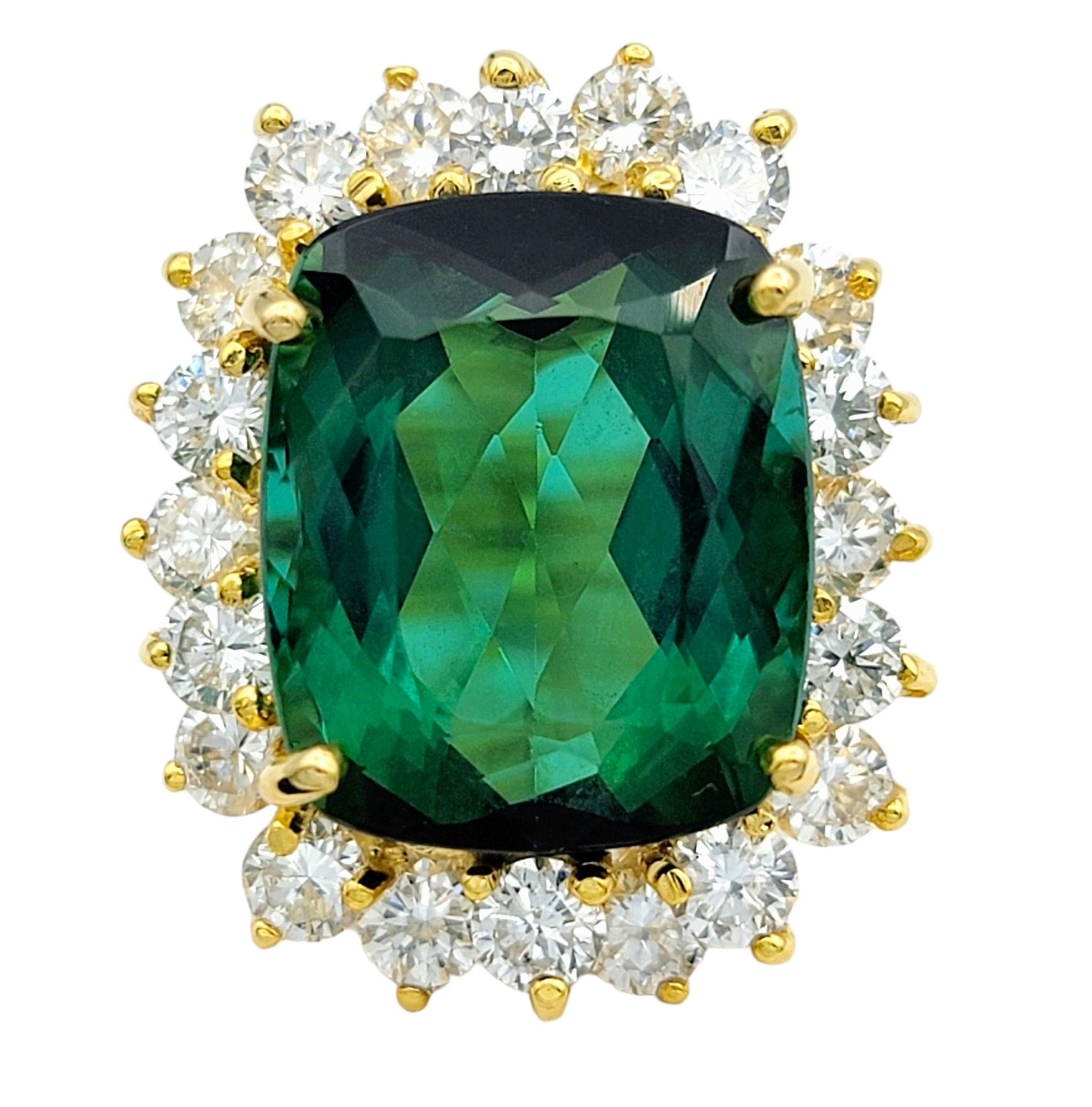 Contemporary Large Cushion Cut Green Tourmaline and Diamond Halo Ring in 14 Karat Yellow Gold For Sale