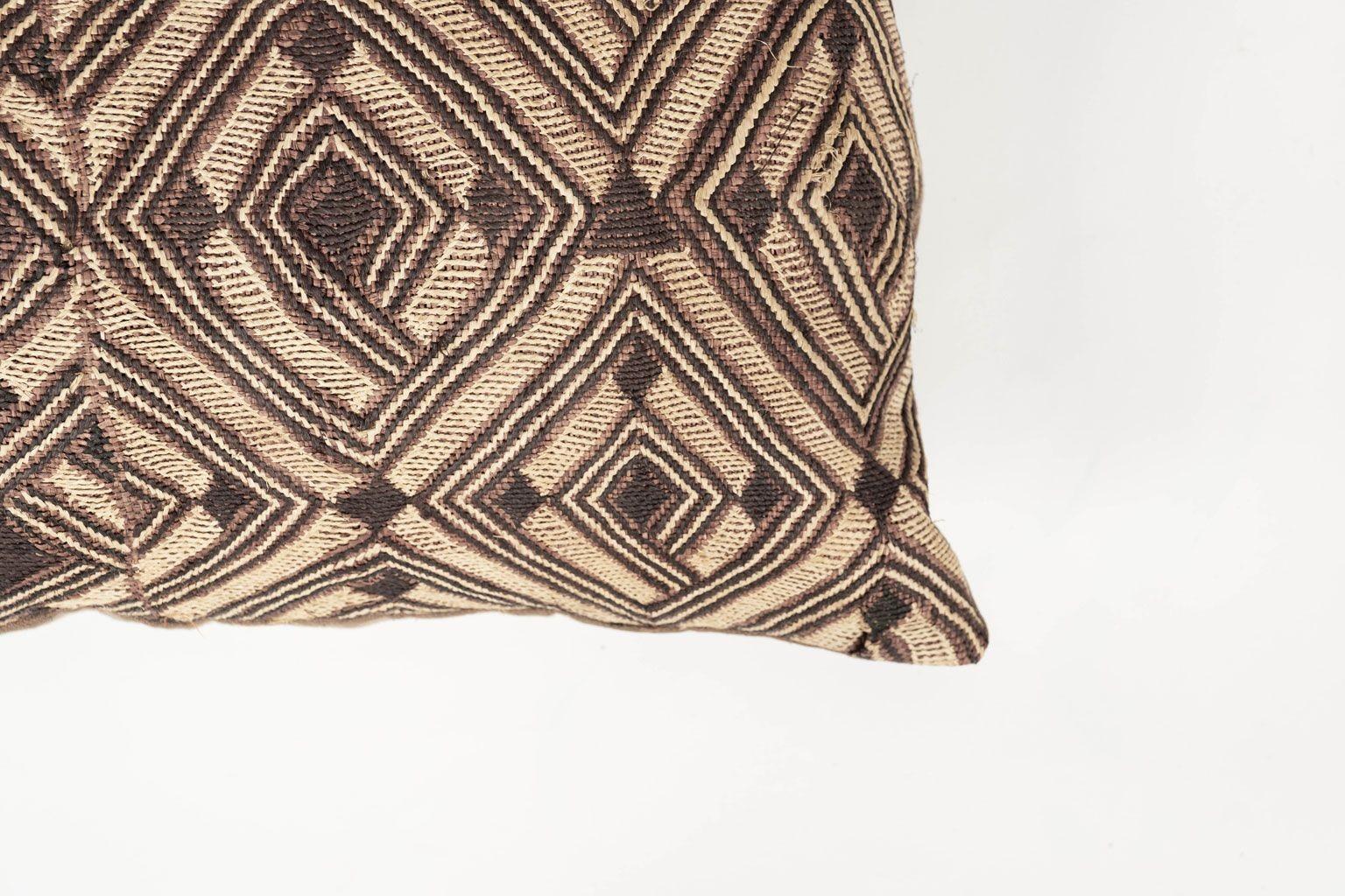 Large custom cushion from vintage African Kuba cloth. Hand-dyed and woven raphia palm with cut pile to resemble velvet. Backed with brown linen. Includes zip fastener and feather insert.