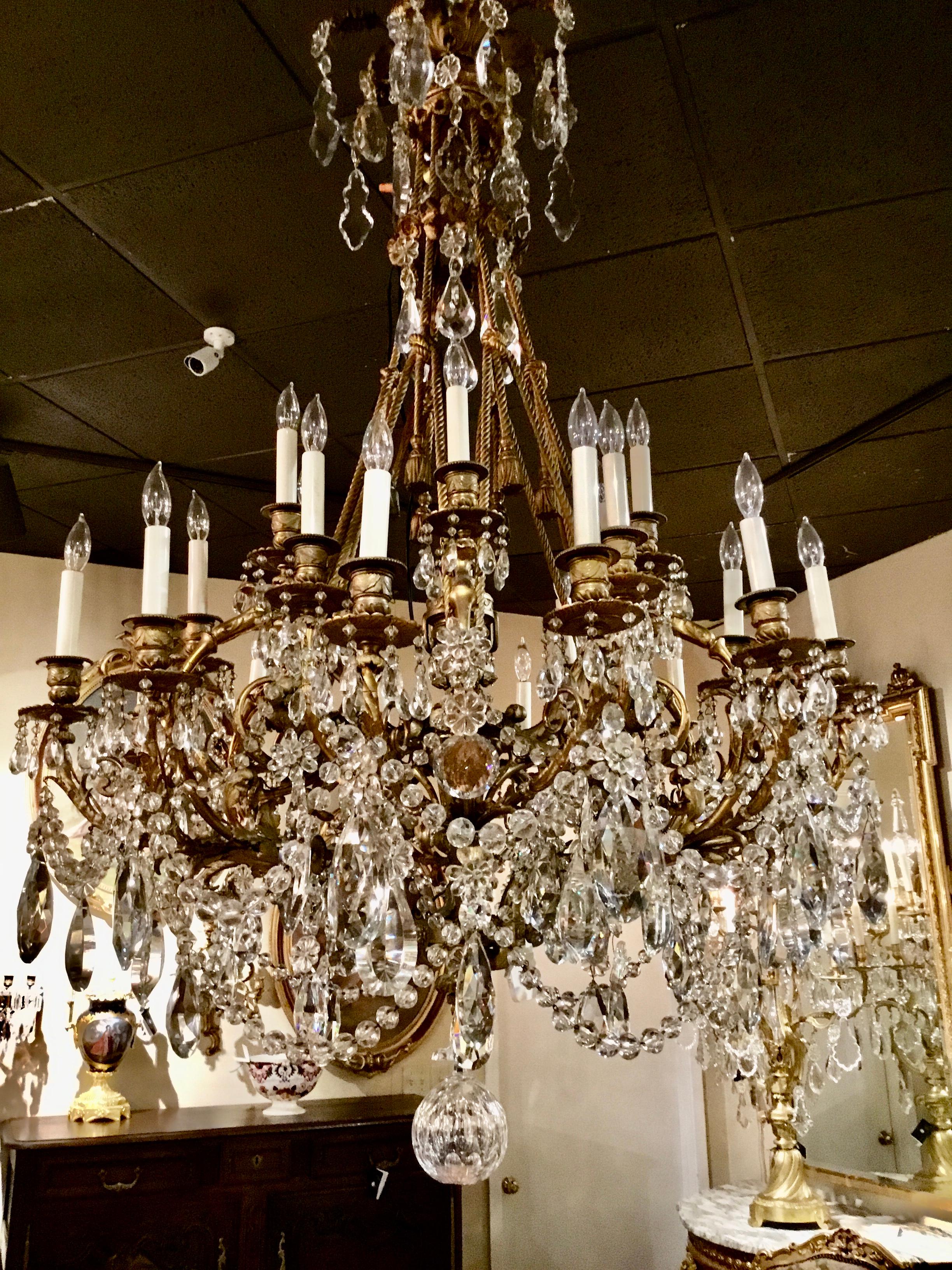 Three tiers of lights with a total of 24 lights decorate this incredible piece.
It was custom designed for a ship builders home in the city of New Orleans
The roped bronze supports and tassels were designed to have a
Relevance to the occupation