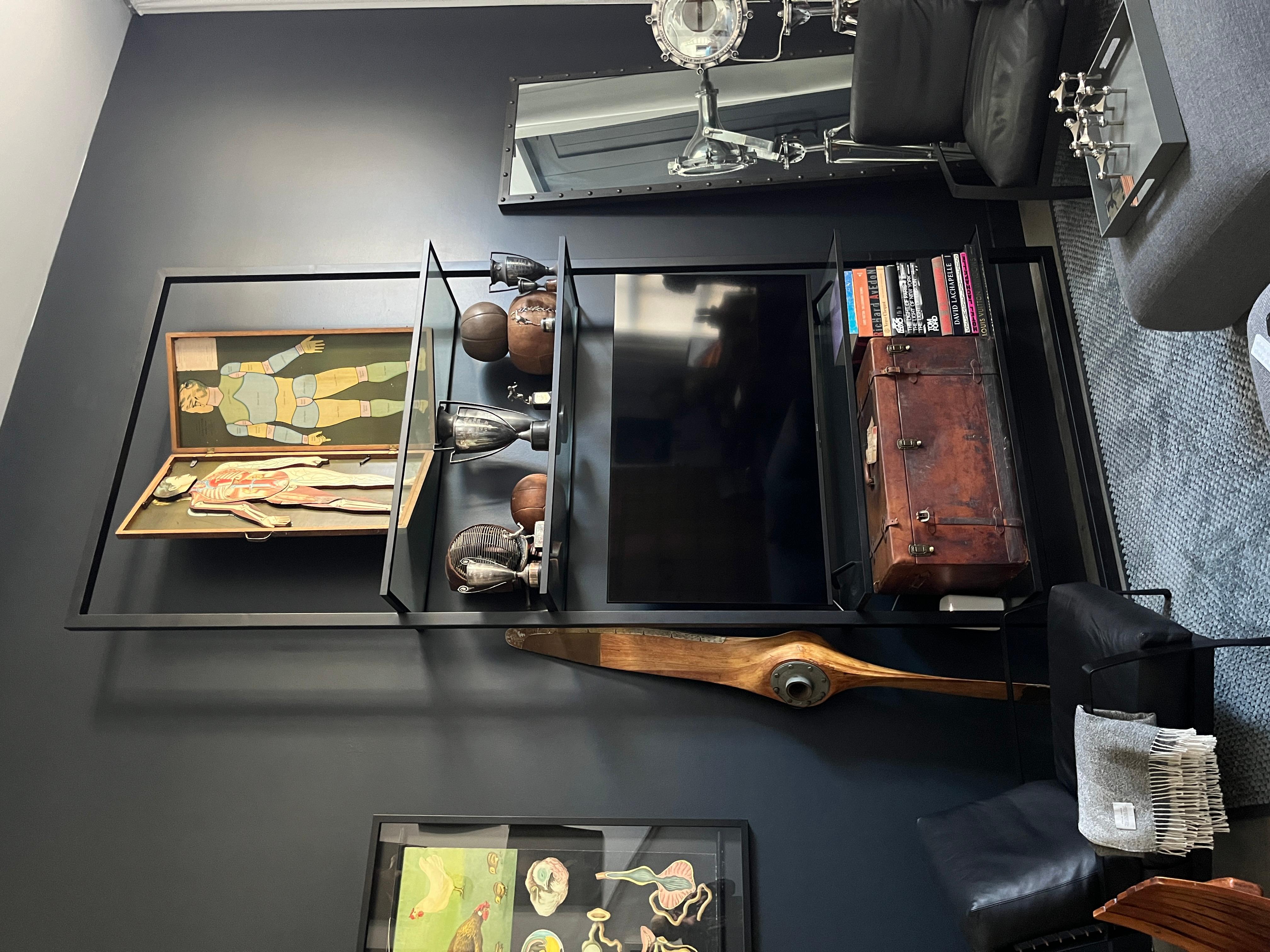 ABOUT

Original custom large steel and glass shelf designed to float against the wall. Modern and minimal design. Outer rectangular steel frame supporting four large shelves. The piece is mounted on the wall through counter sunk holes within the