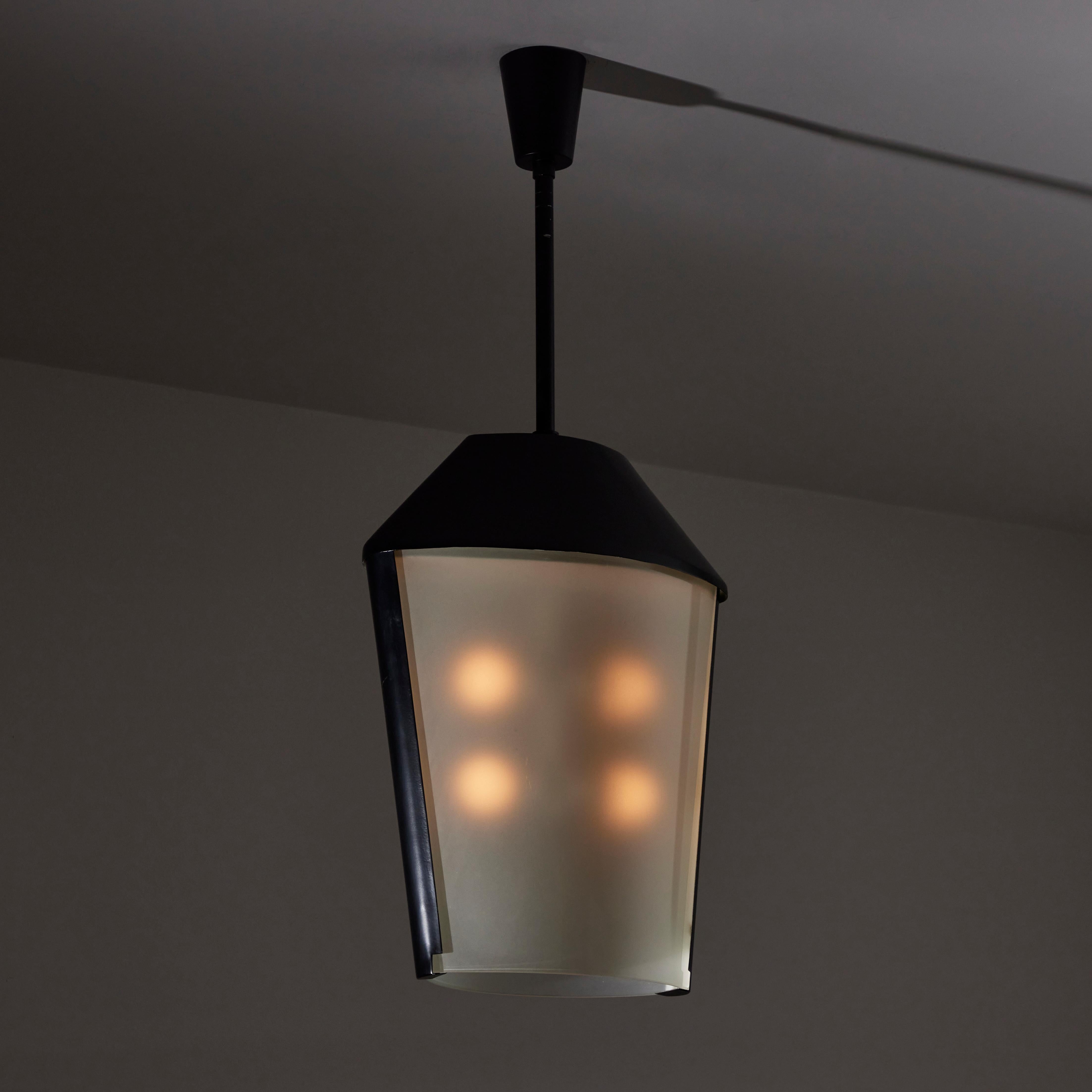 Large Custom Italian Ceiling Light. Designed and manufactured in Italy, circa the 1940s. Sleek and Industrial ceiling light with sandblasted steel enameled frame and double end frosted glass shades. This piece holds four E27 bulb sockets, adapted