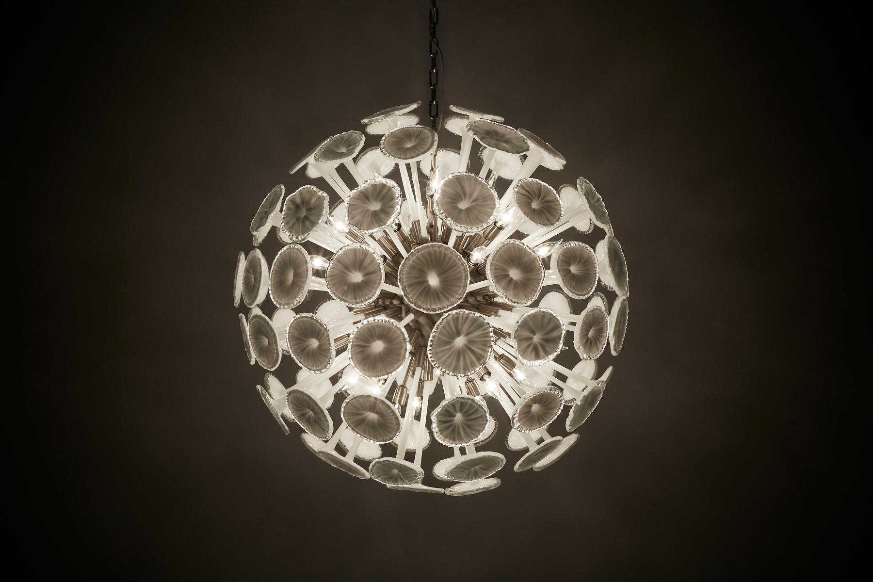 Large sputnik style chandelier by La Murrina. Large custom size at 39 in. diameter. Nickel central sphere and fittings. White and clear blown glass floral trumpets emanate from the central sphere.

No canopy or chain present.