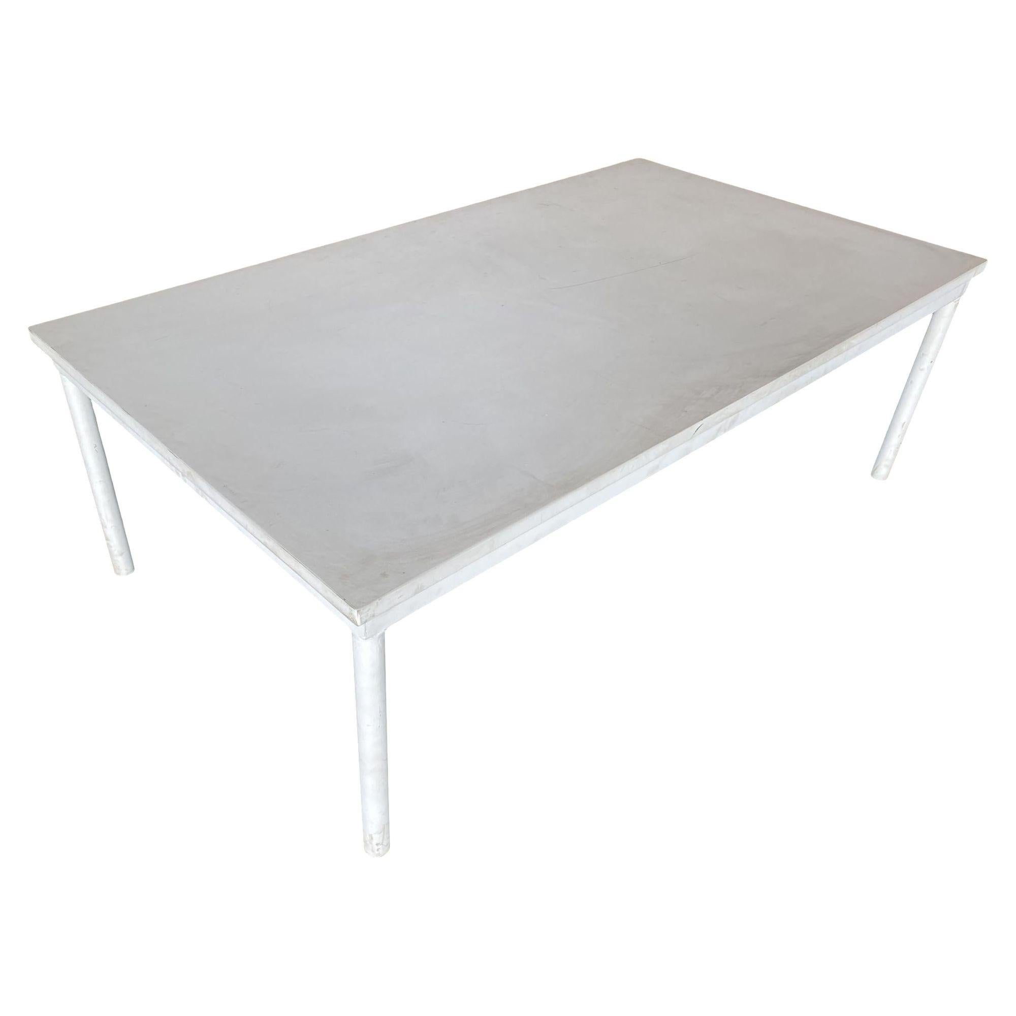 Large custom made modernist mod coffee table featuring a large MDF top and welded tubular steel frame. Measure: 50