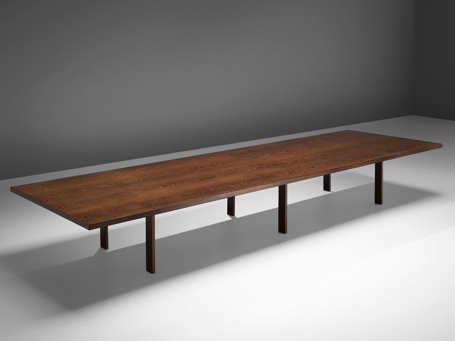 Dining or conference table, wengè, Denmark, 1960s.

This unique Minimalist, modest table is completely executed in wengé. The top shows a bookmatched wengé veneer, resulting in a jaw dropping pattern of natural flames of the tropical wengé. This