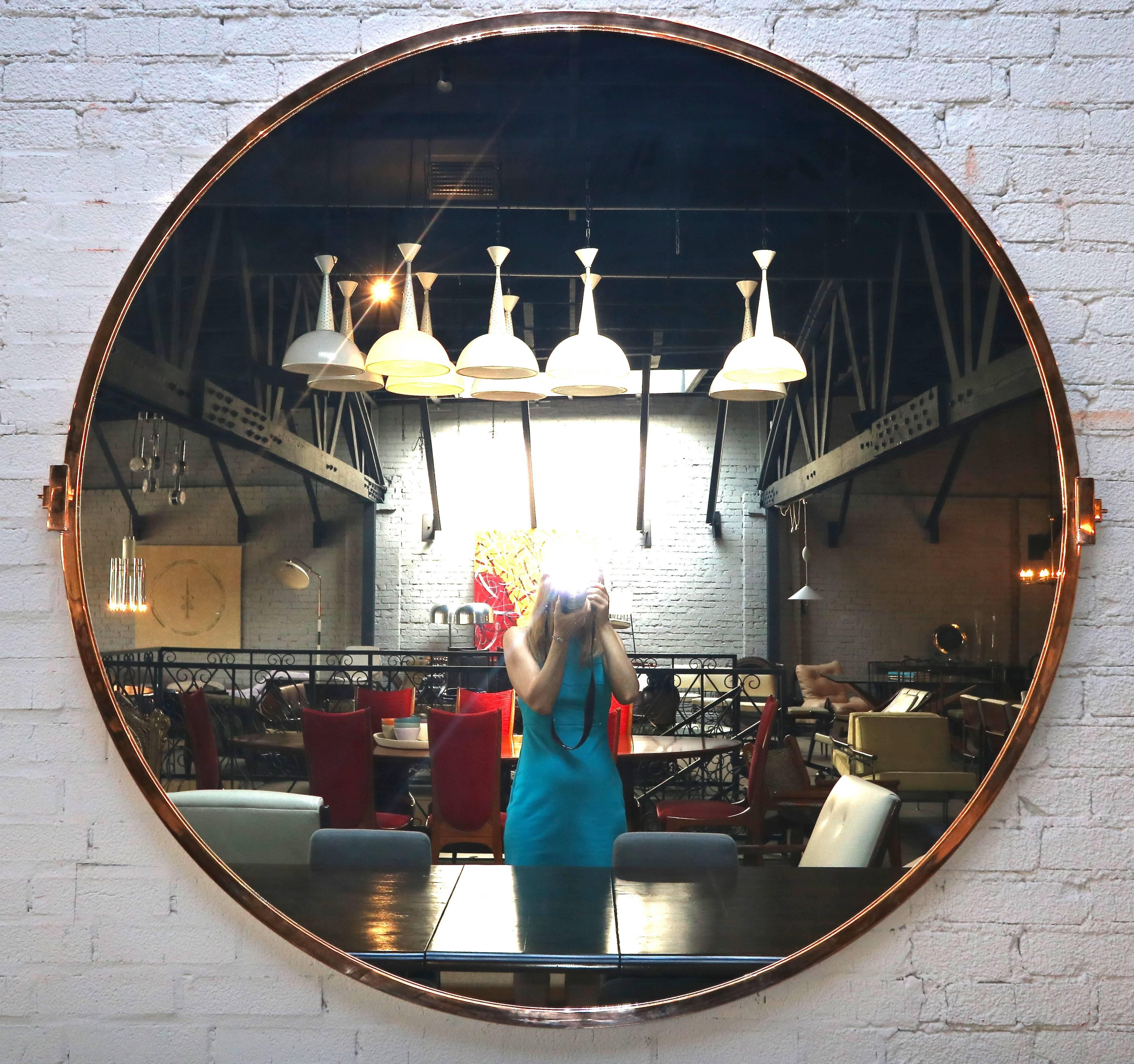 Large custom 5-foot copper mirror with side brackets.  Handmade in Los Angeles by Adesso Imports. Can be done in different shapes, sizes and finishes.