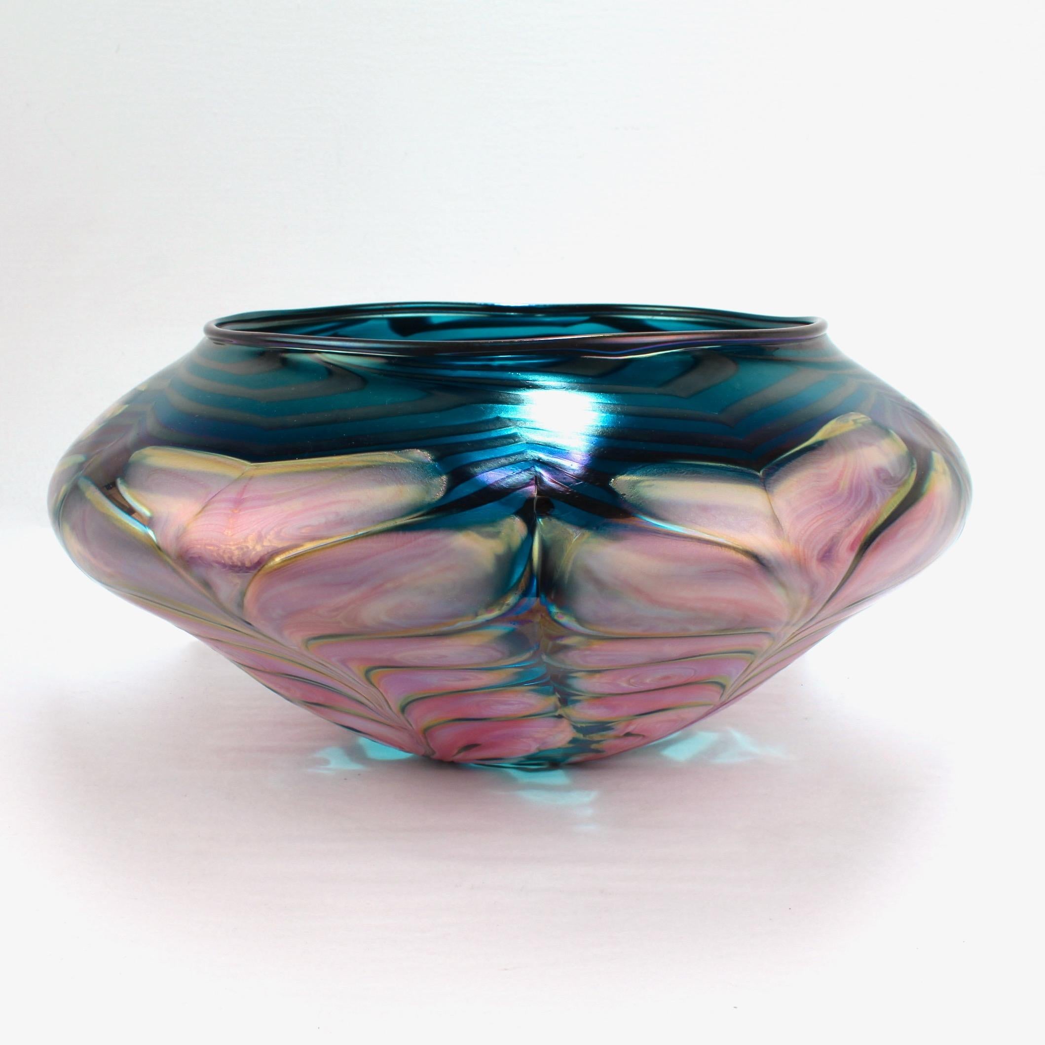A very large Daniel Lotton art glass bowl or vase.

With pulled feather decoration in pink overlay on a blue ground.

Simply great craft!

Date:
1991

Overall condition:
It is in overall good, as-pictured, used estate condition with some