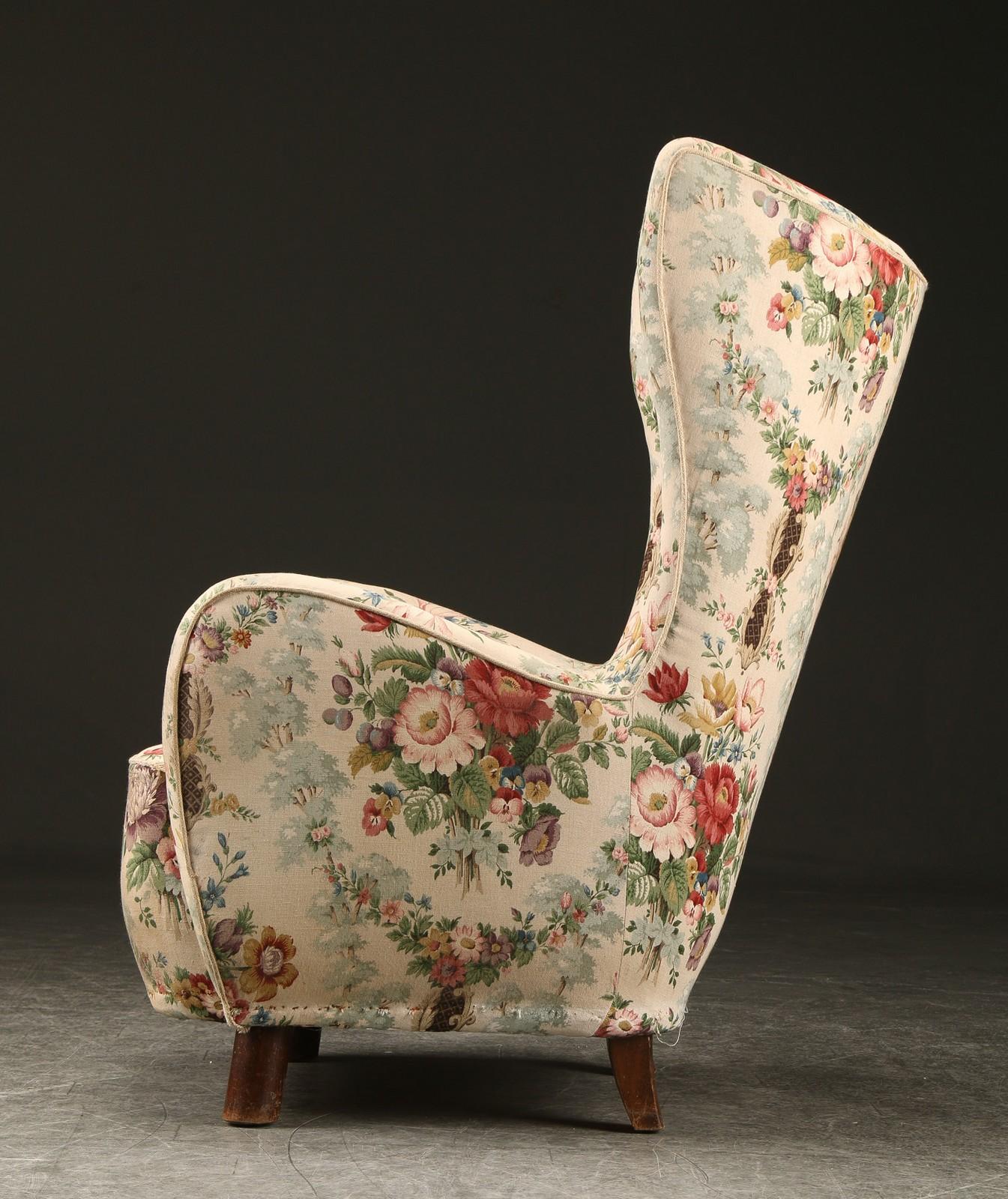 Large Danish architectural form upholstered wingback chair attributed to Danish designer Mogens Lassen.