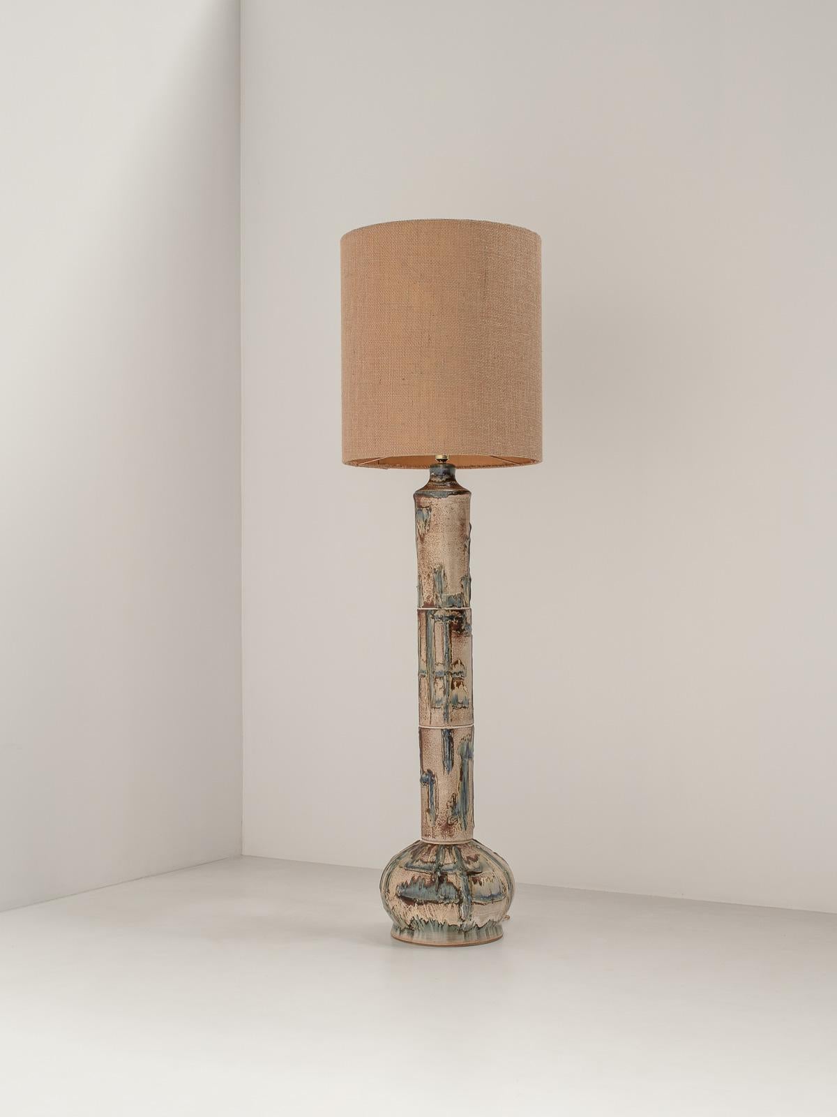 Exceptional Danish Ceramic Floor Lamp attributed to Viggo Kyhn, 1960s, Mid-century, Scandinavian.

Elegant, warm, and soft are the words that come to mind with this lamp. The ceramic base has been hand-made and features beautiful cream, beige, baby