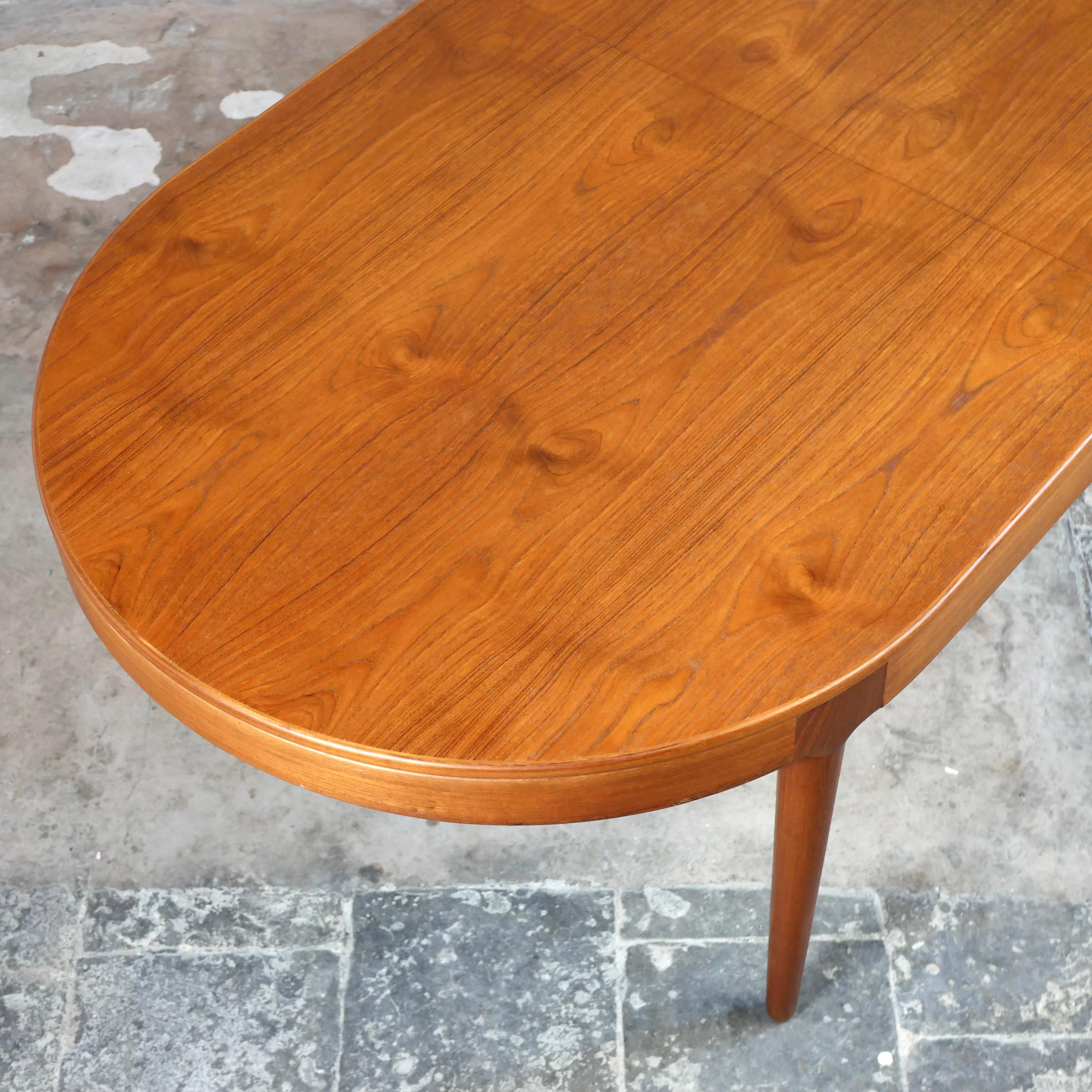Large danish expandable teak table by Arne Hovmand-Olsen for Mogens Kold, 1960s 1