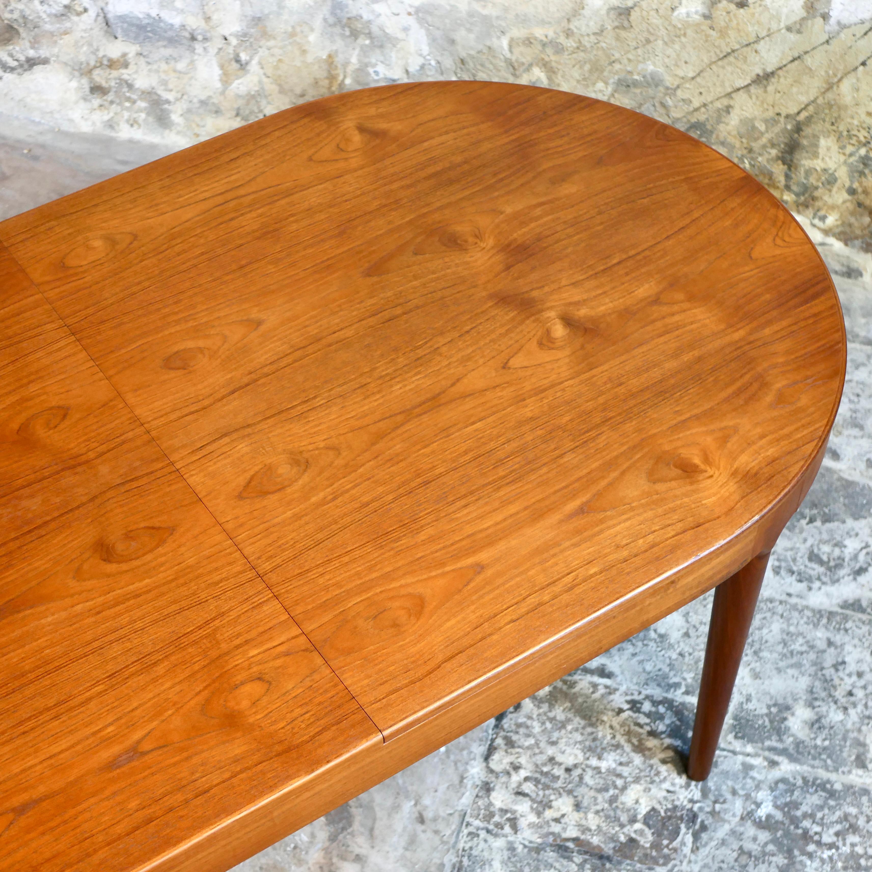Large danish expandable teak table by Arne Hovmand-Olsen for Mogens Kold, 1960s 2