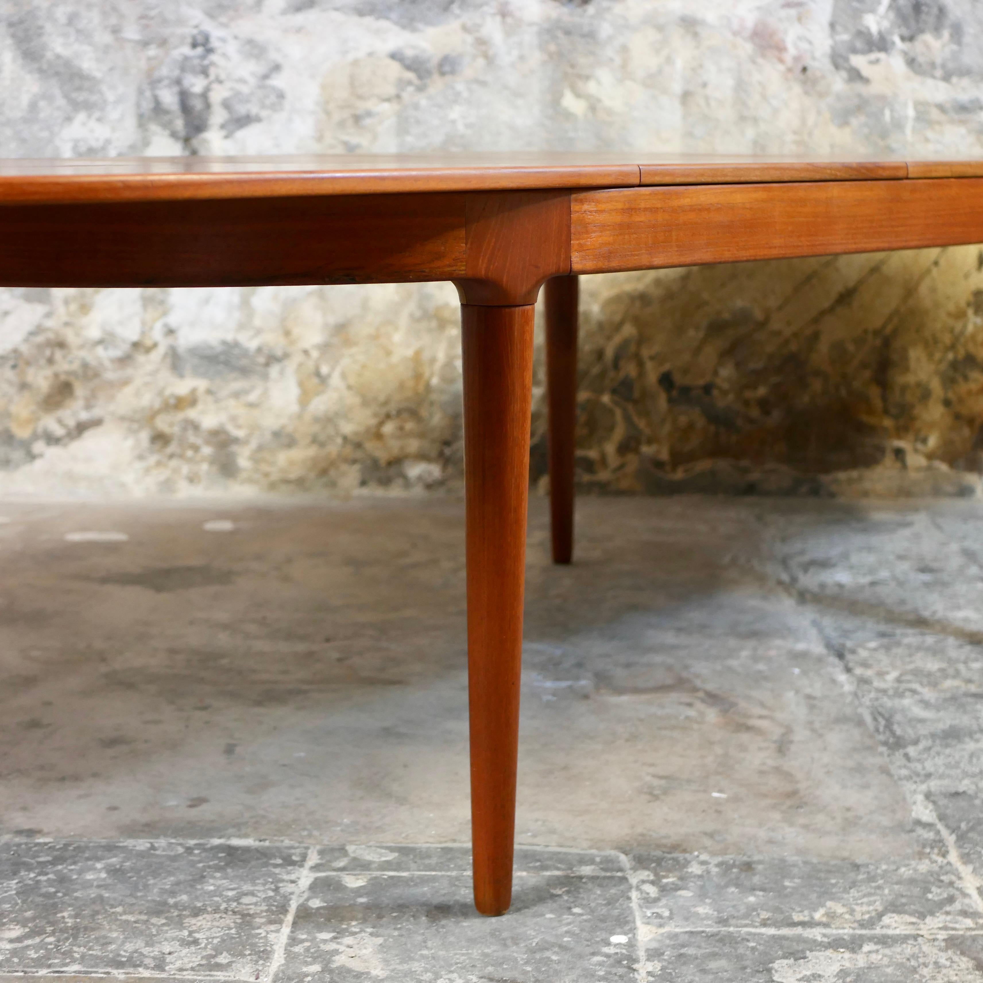 Large danish expandable teak table by Arne Hovmand-Olsen for Mogens Kold, 1960s 4