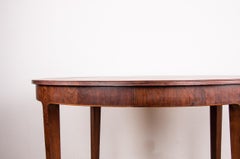 Large Danish extendable dining table in Rosewood by Hugo Frandsen for Spottrup.